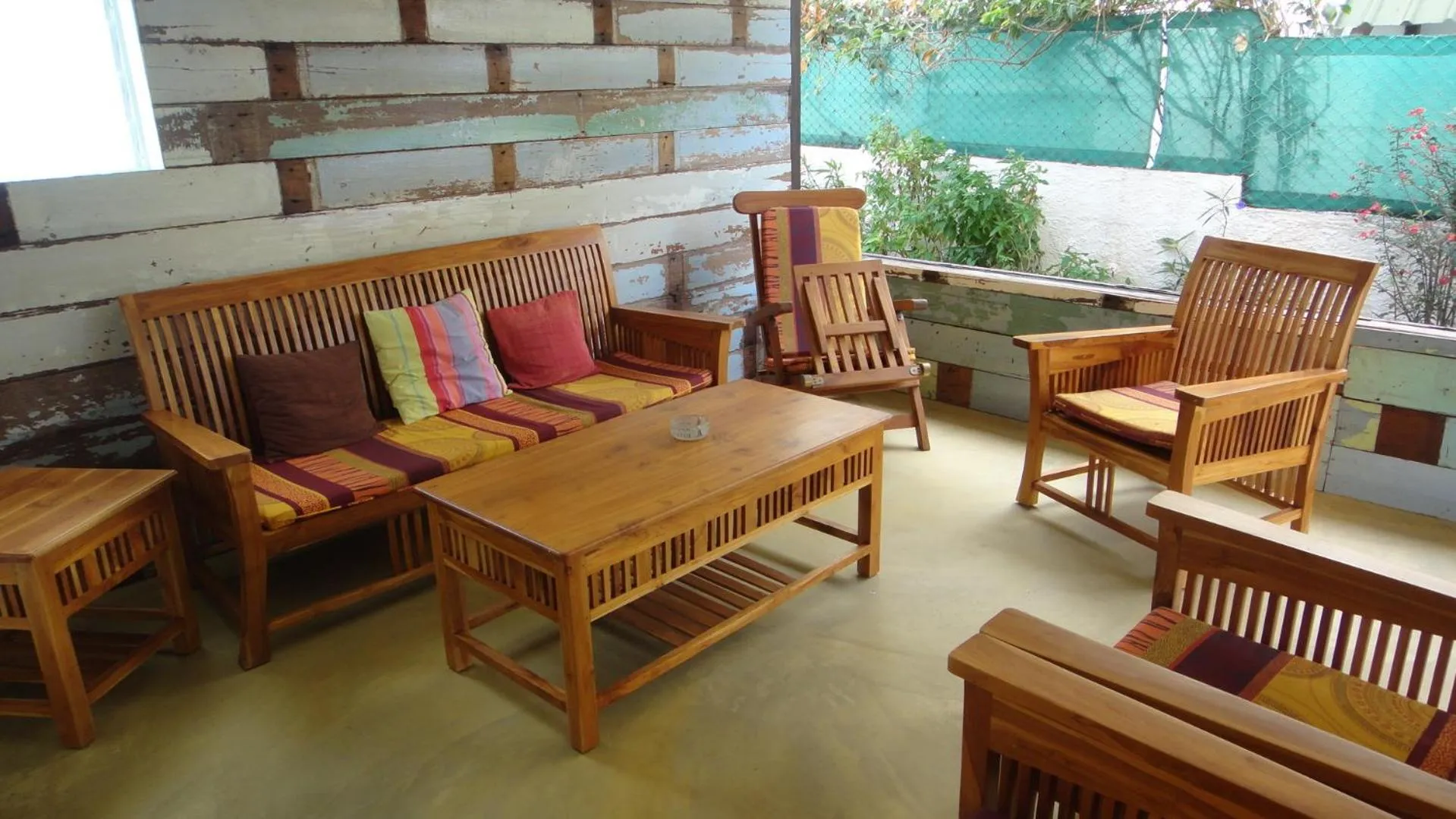 Communal lounge/ TV room in Colibri Beach Villas