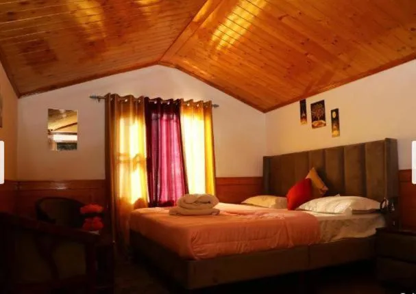 Bed in Valley Gulmohar Homestay