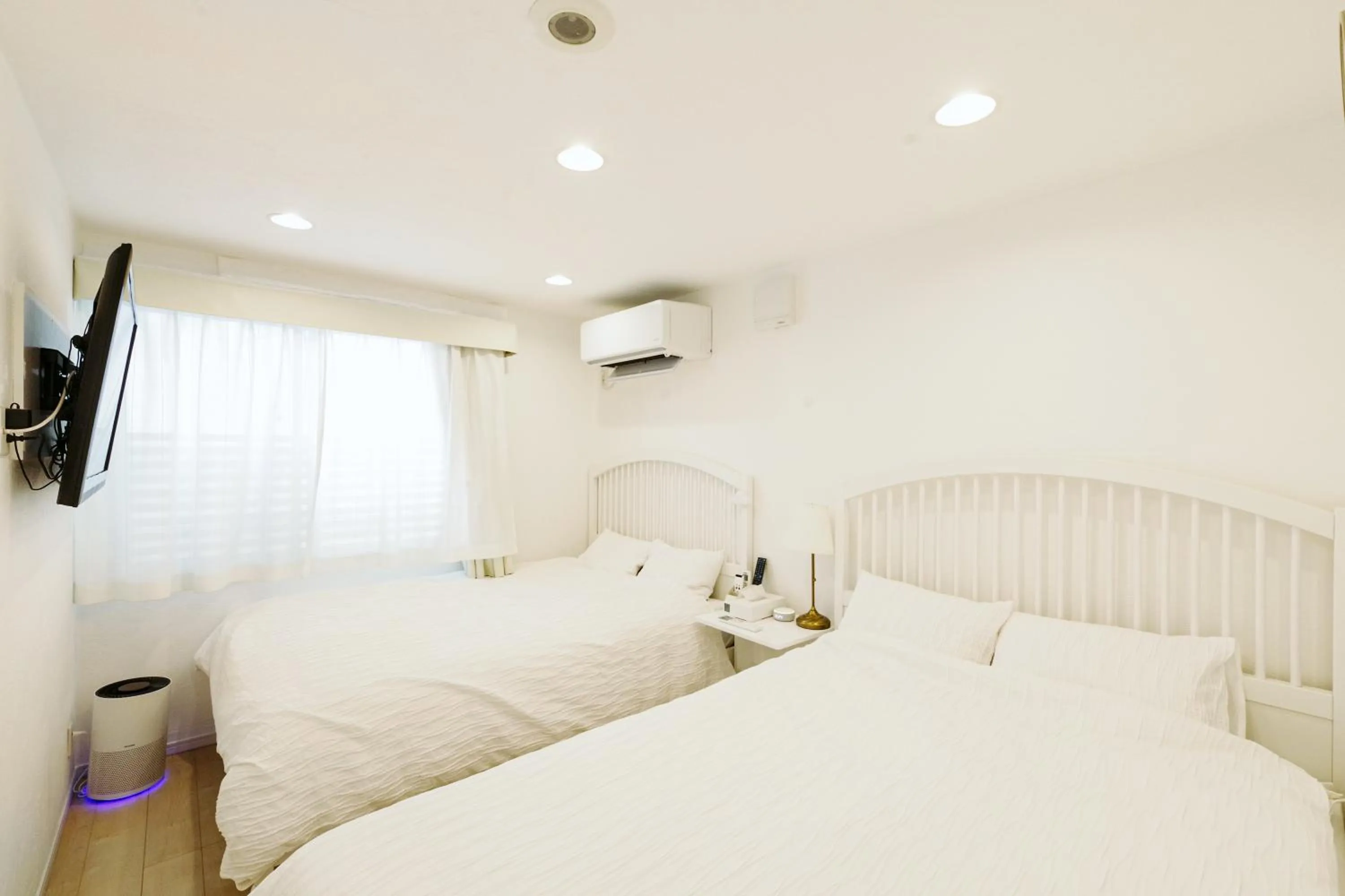 Bedroom, Bed in Oceanfront Villa Hale Kahakai プライベートサウナ