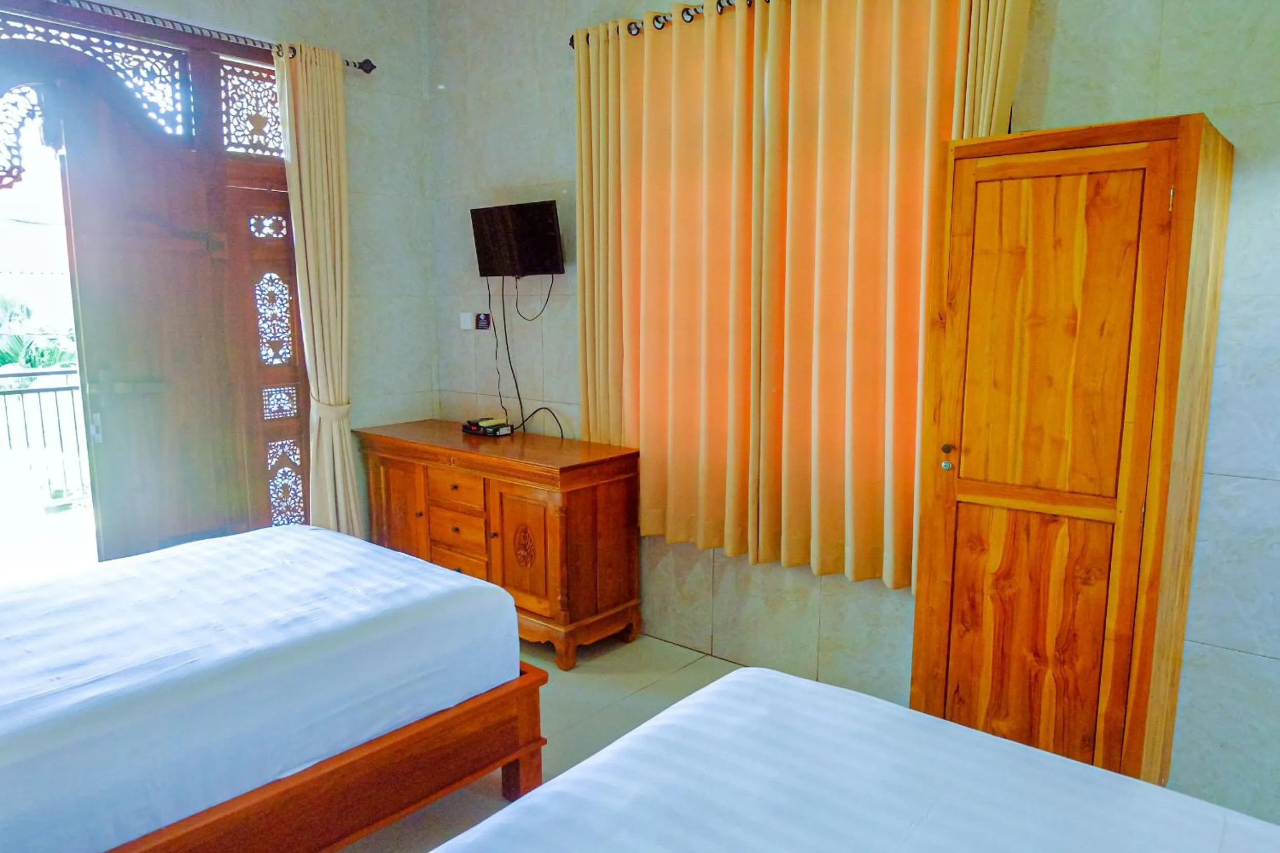 Bed in Adi Homestay