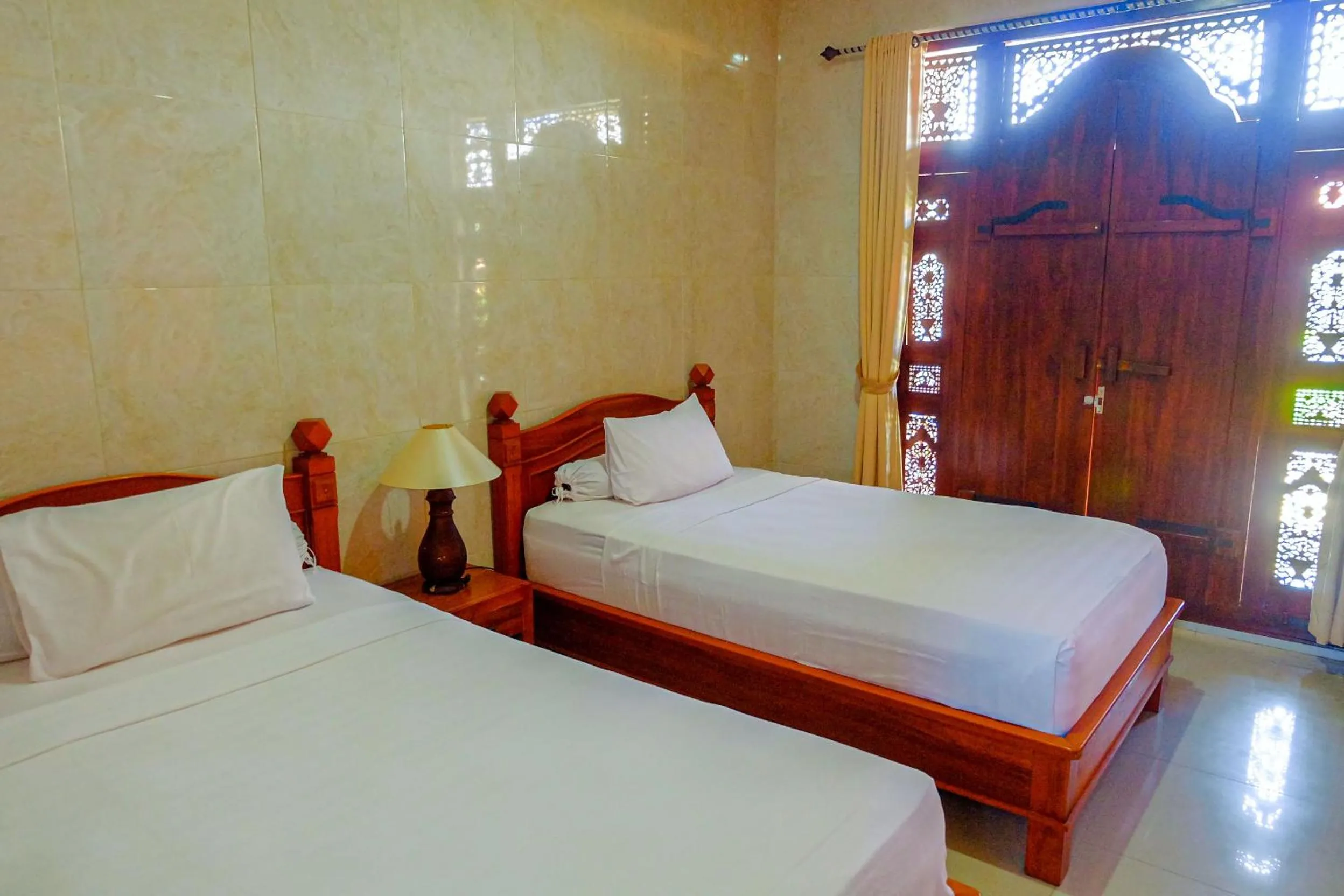 Bed in Adi Homestay