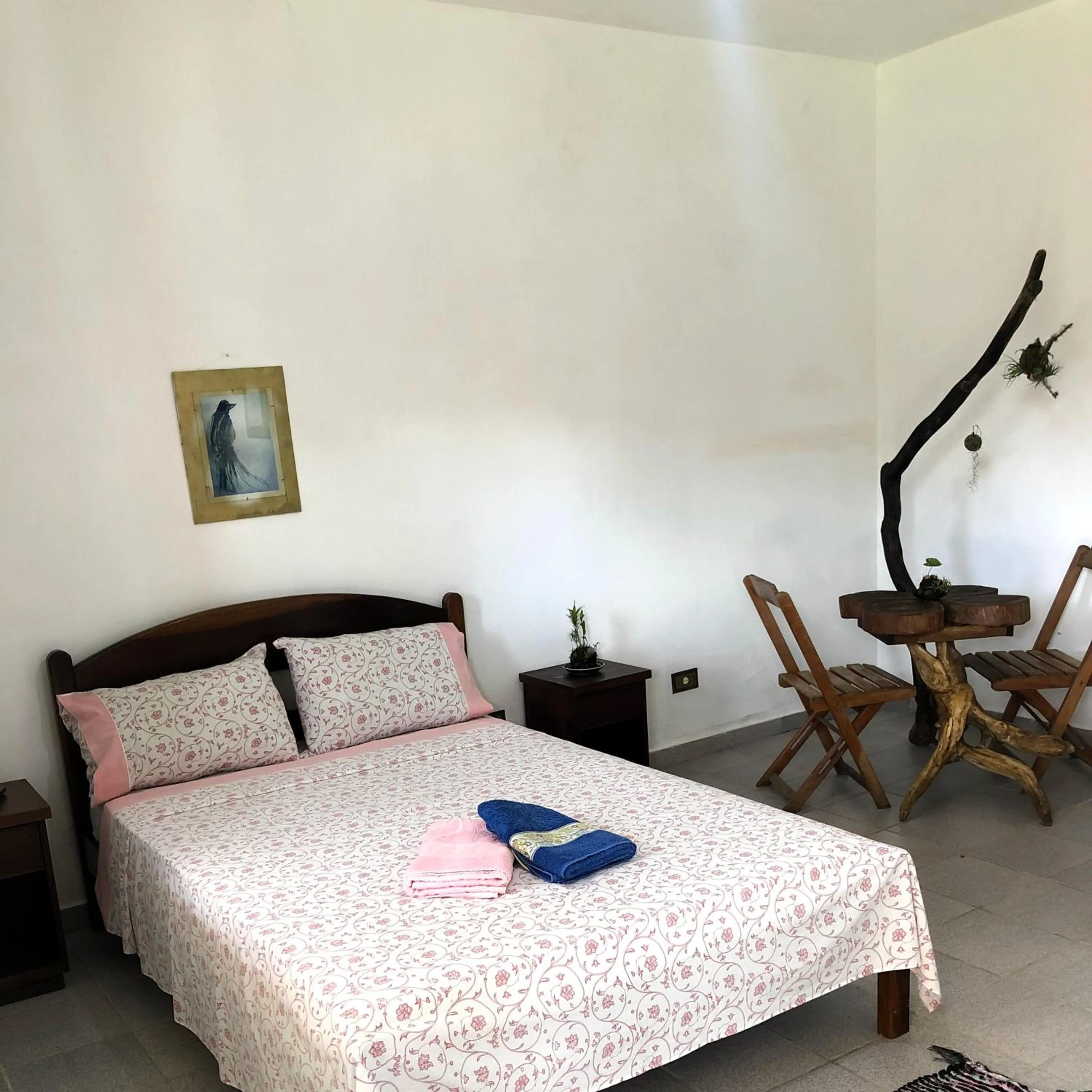 Bed in Pousada Atelier Aly da Costa