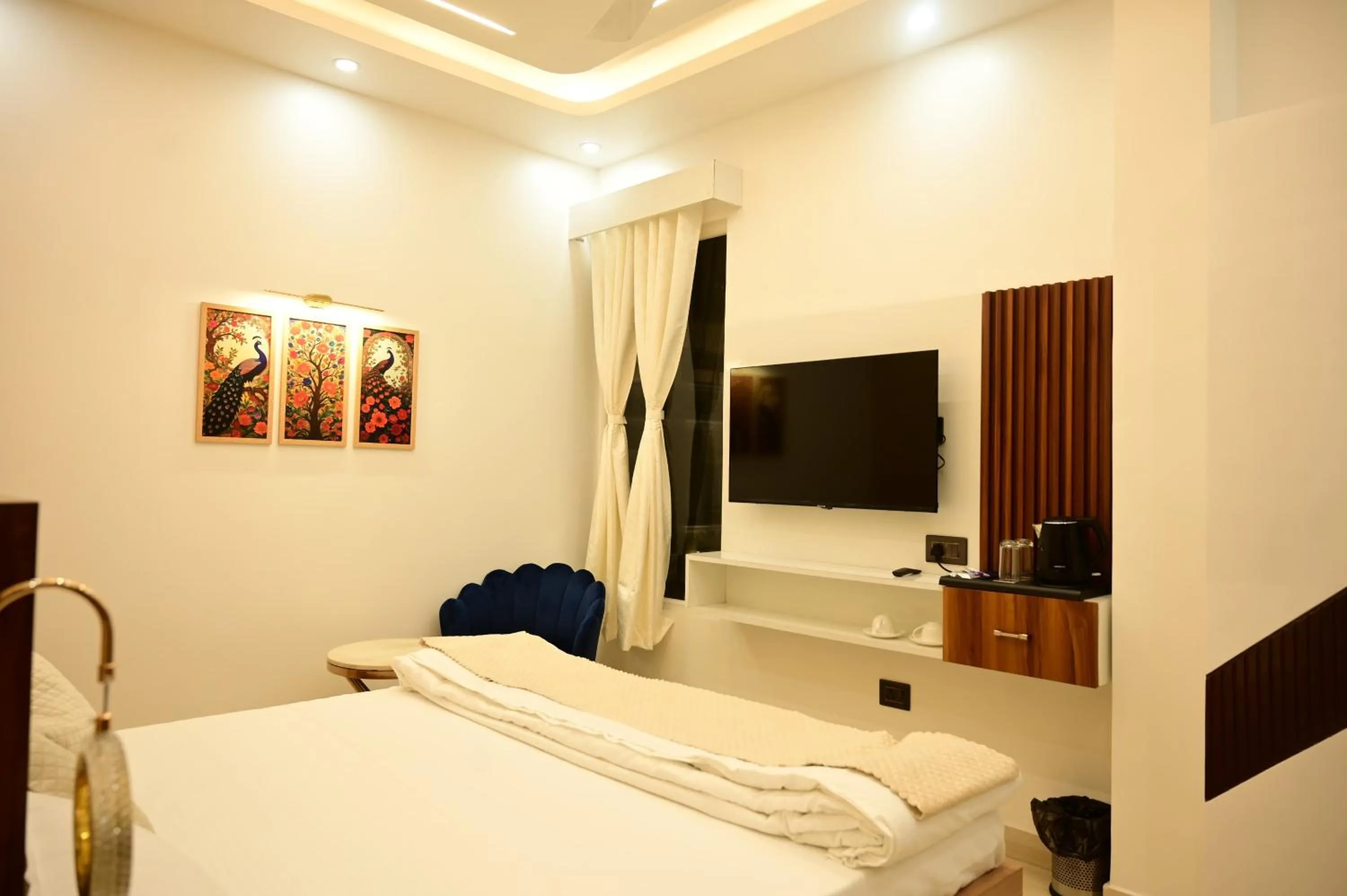 Bed in Hotel Vedic Inn