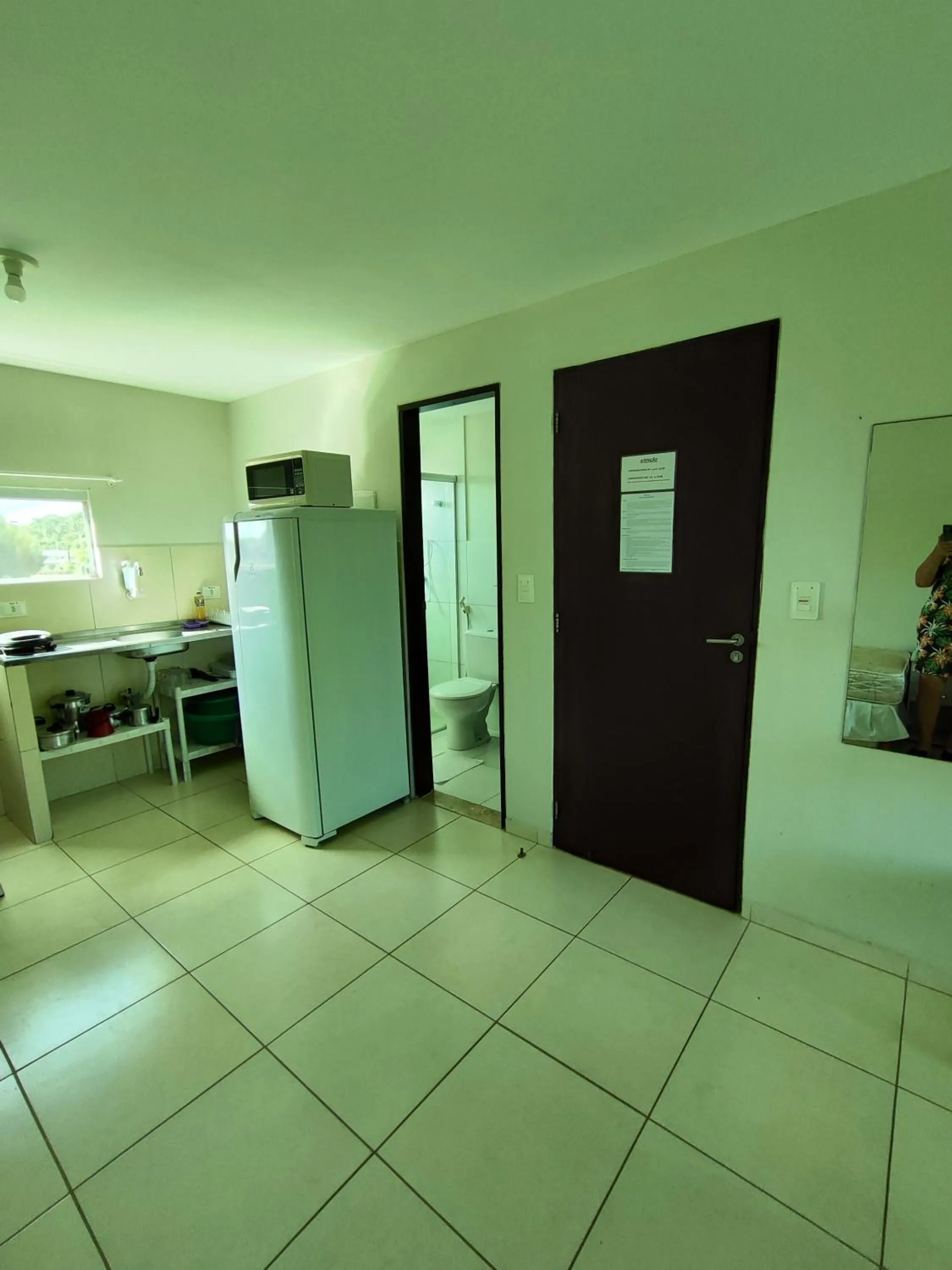 Kitchen or kitchenette in Divinos Flat Carneiros