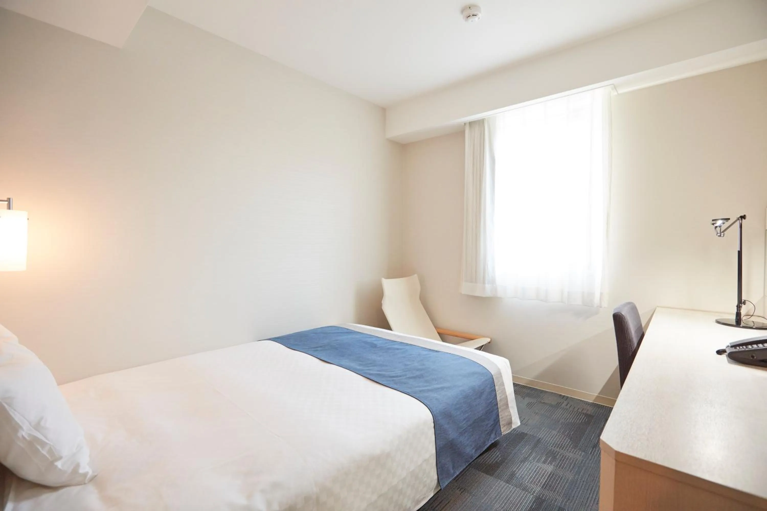 Bed in Hotel Folkloro Sanrikukamaishi