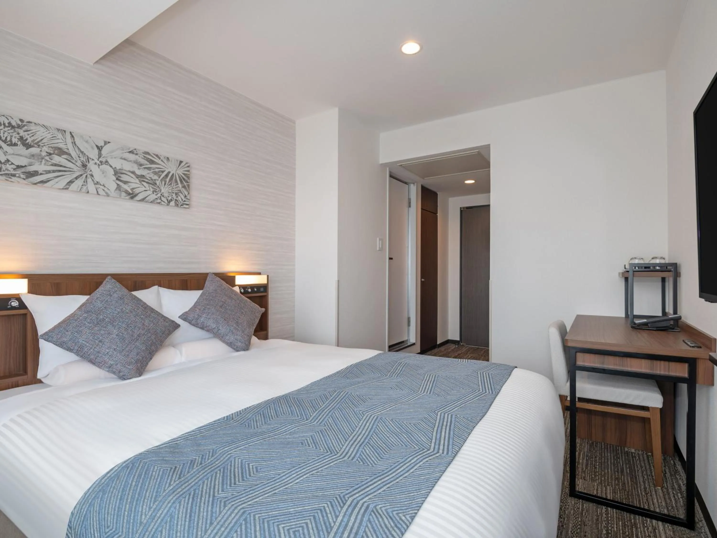 Photo of the whole room, Bed in ART HOTEL Miyazaki Sky Tower