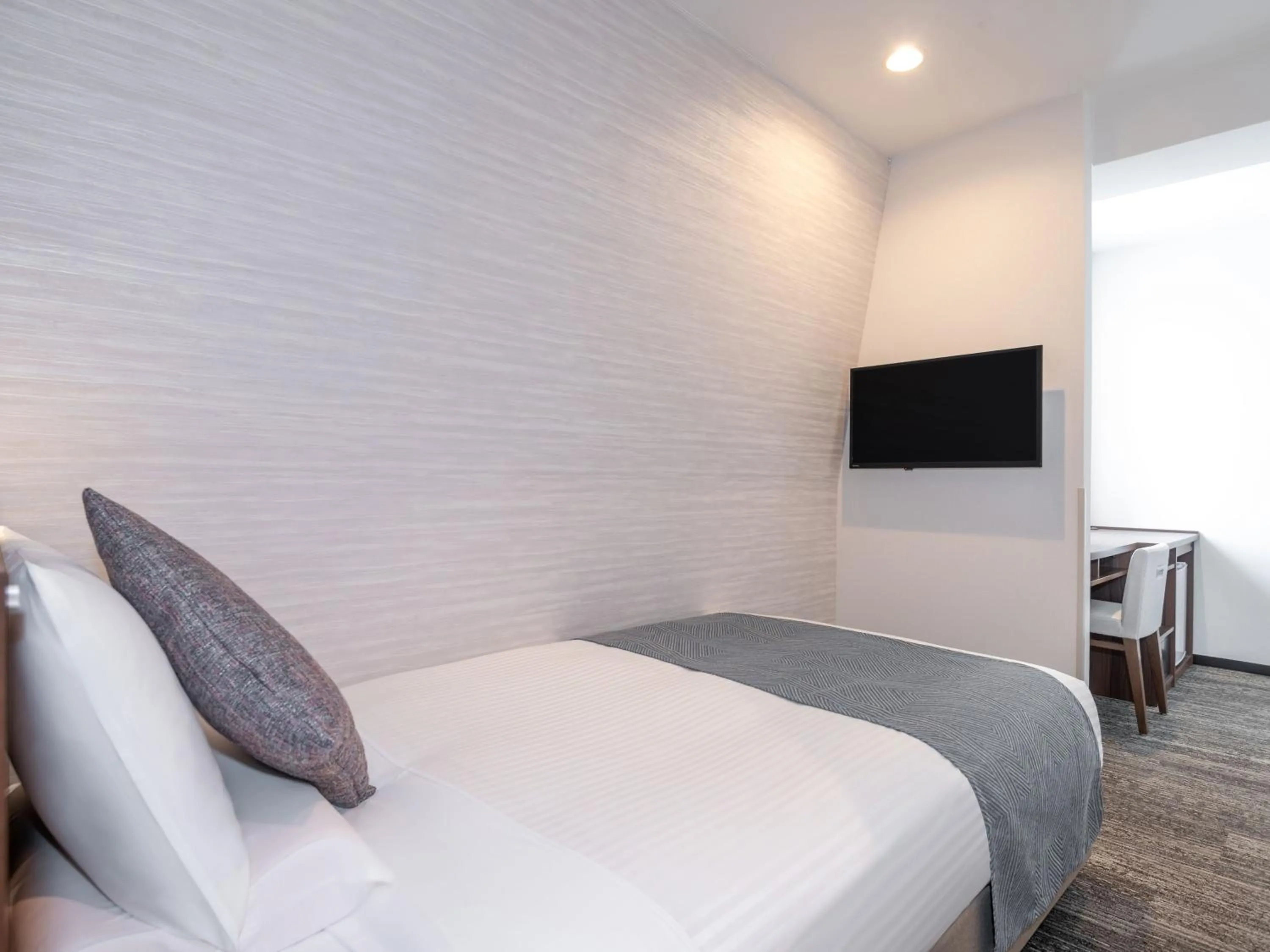 Photo of the whole room, Bed in ART HOTEL Miyazaki Sky Tower