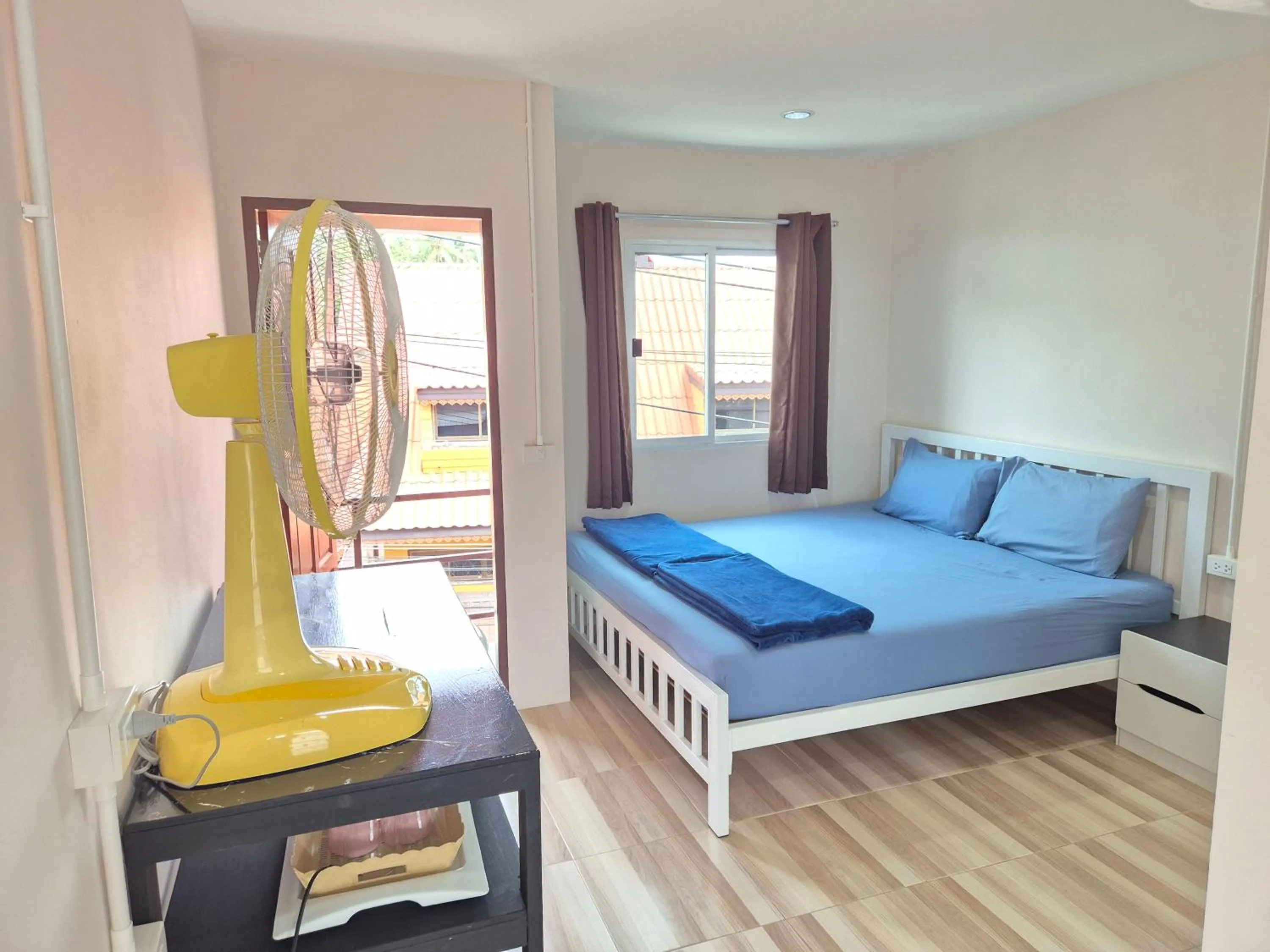 Bed in Sairee Center Guest House