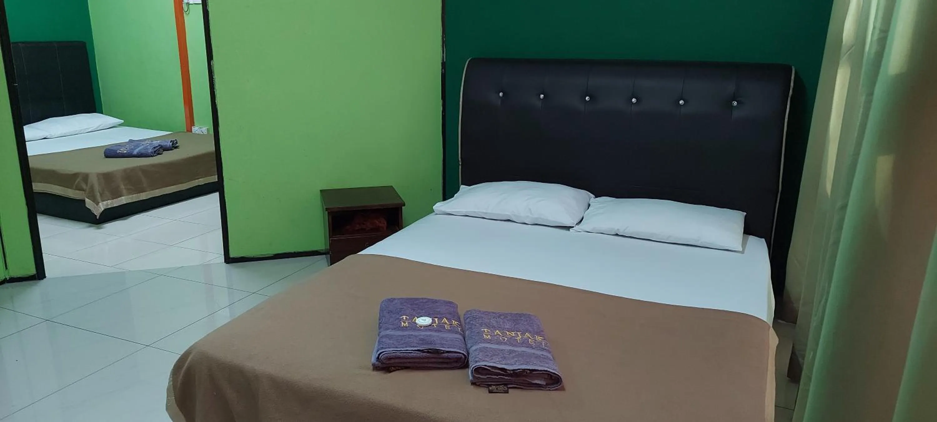 Bed in Tanjak Hotel