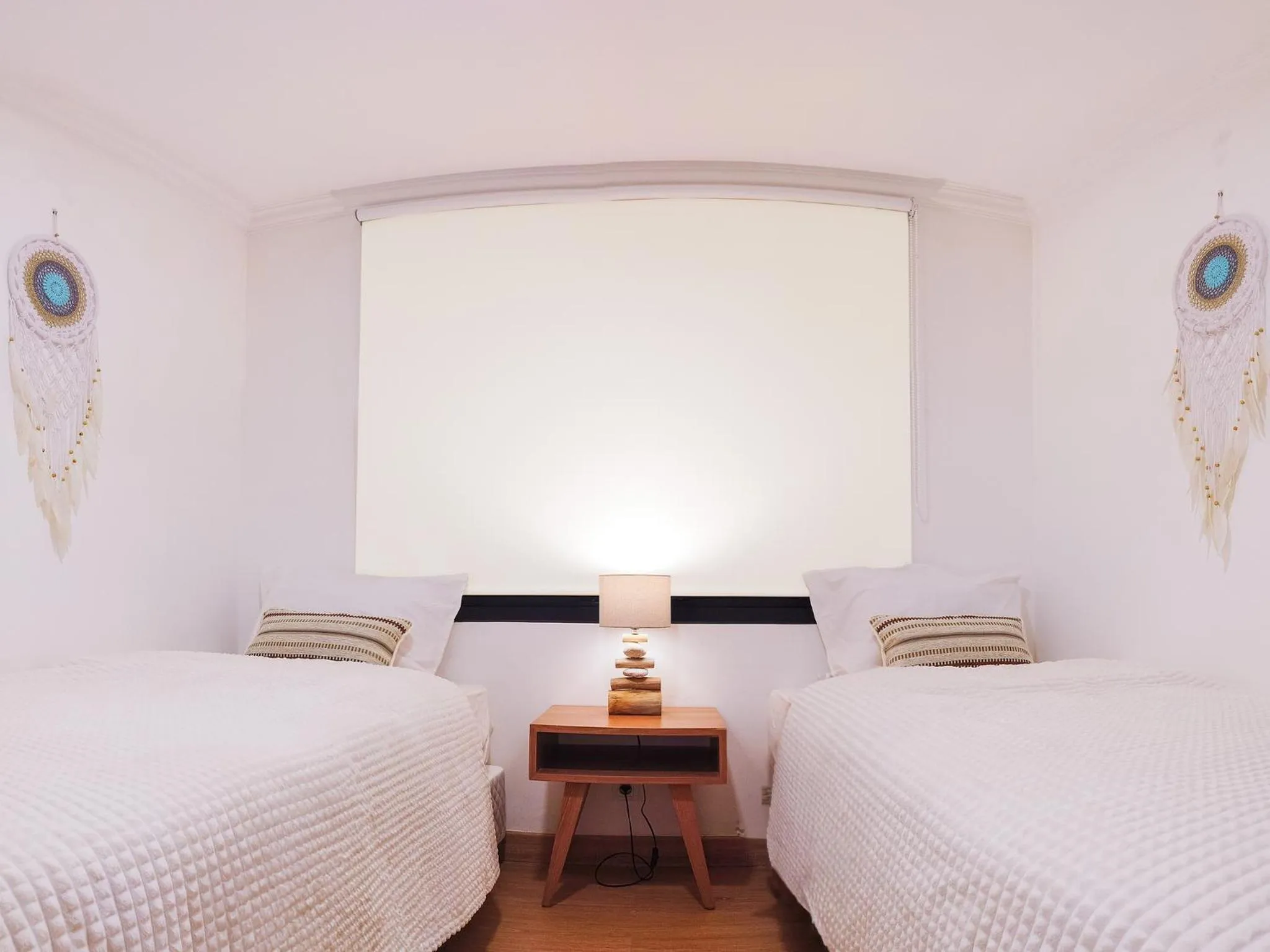 Bedroom, Bed in Ocean Beach Villas - Carita Kondominium