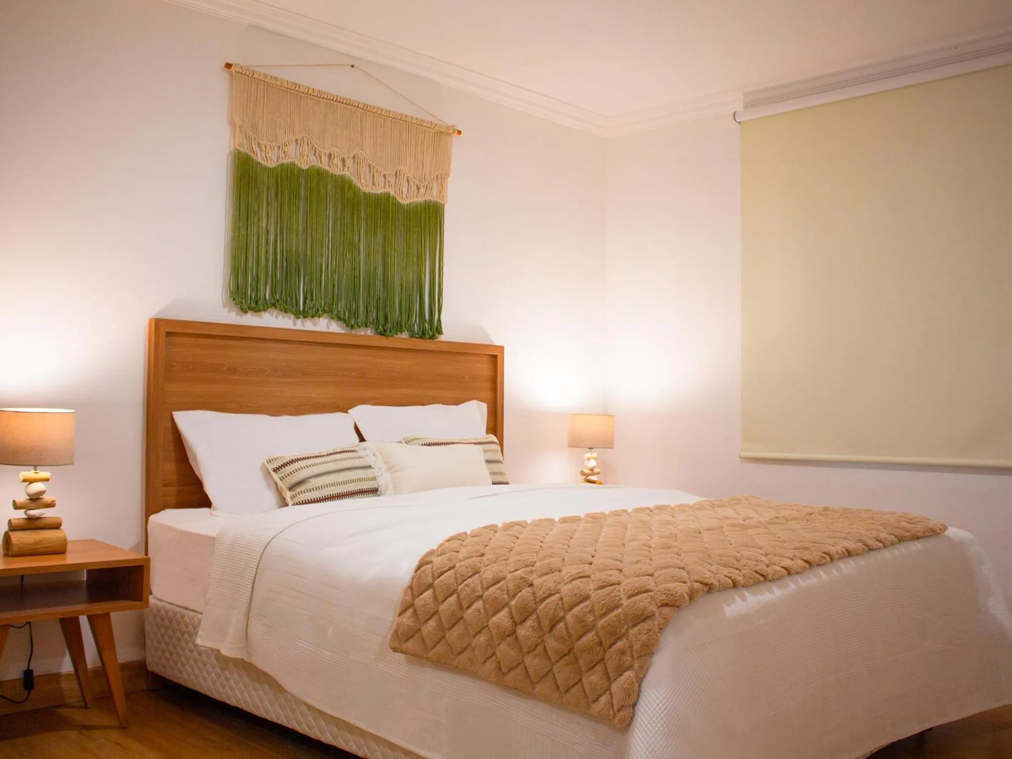 Bed in Ocean Beach Villas - Carita Kondominium