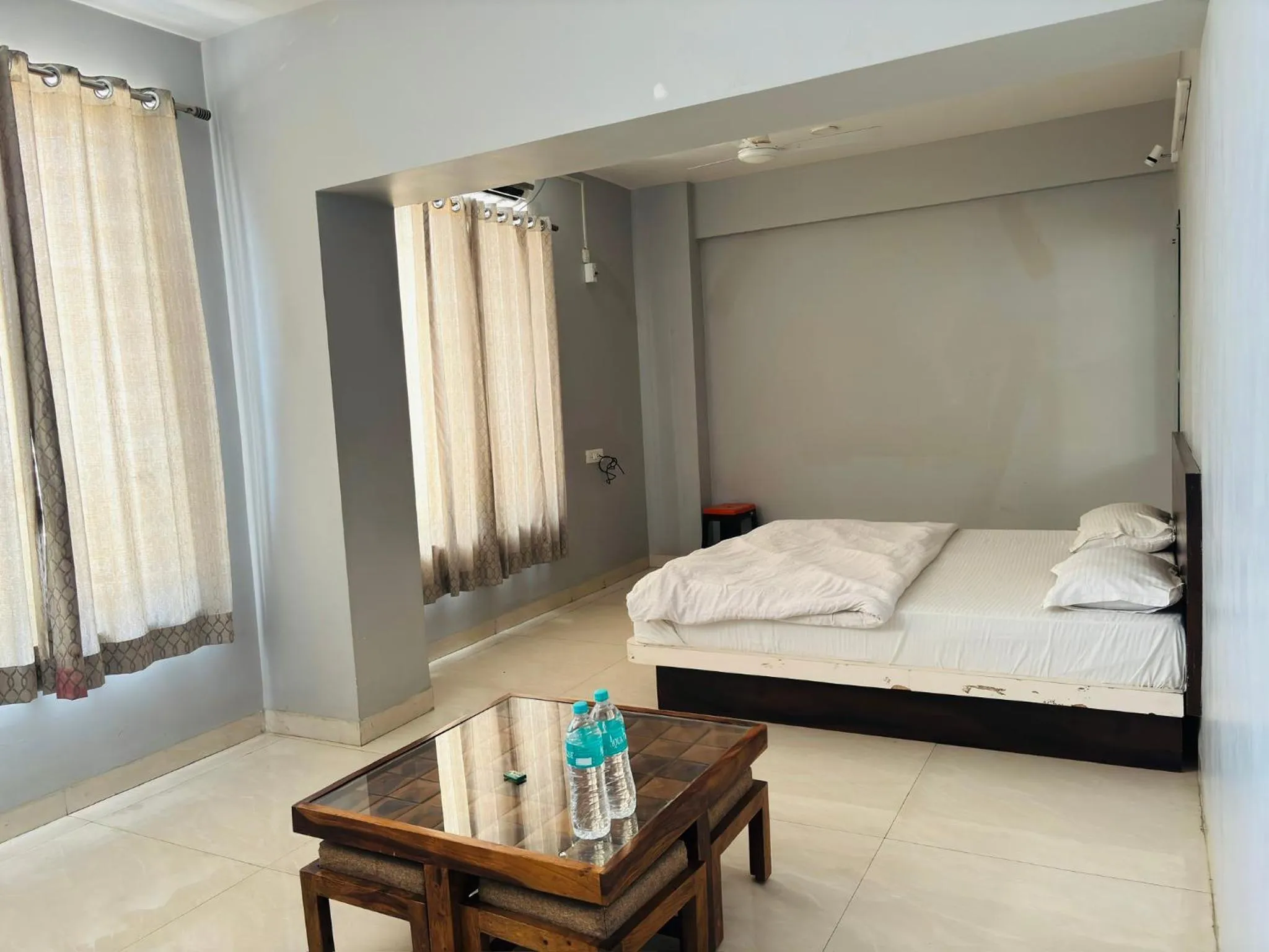 Bed in HOTEL MUSHAK by BAPPA PALACE