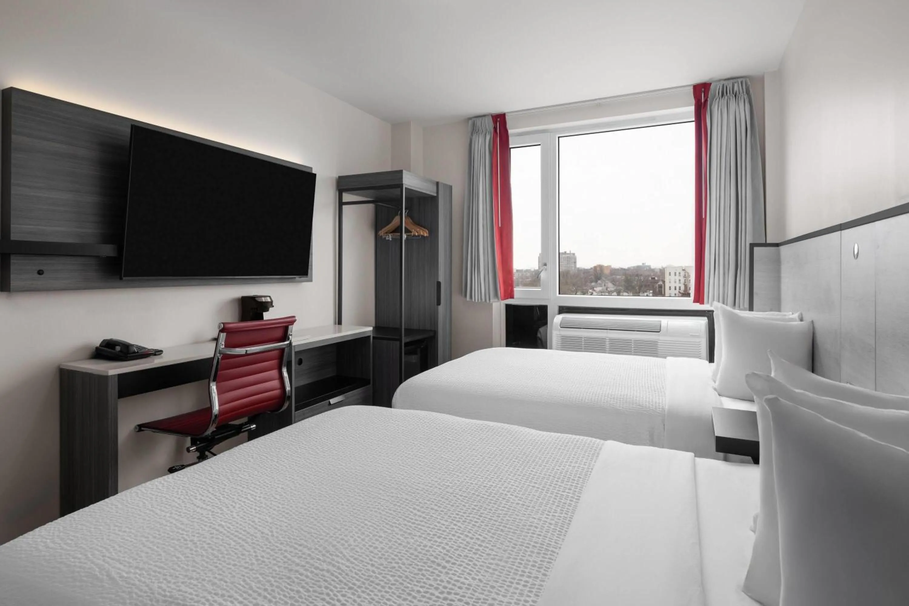 Photo of the whole room, Bed in Ramada by Wyndham Brooklyn Near Flatbush