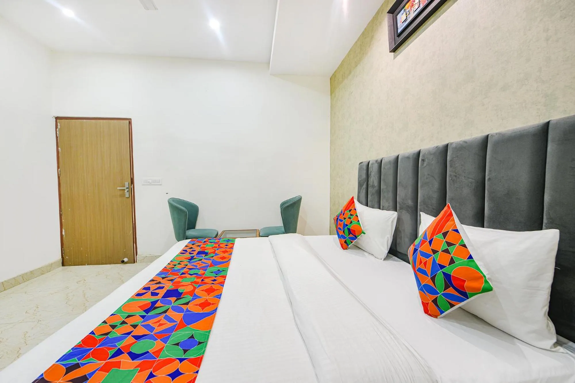 Bed in FabHotel Kavya Inn - Nr The Mall of Faridabad