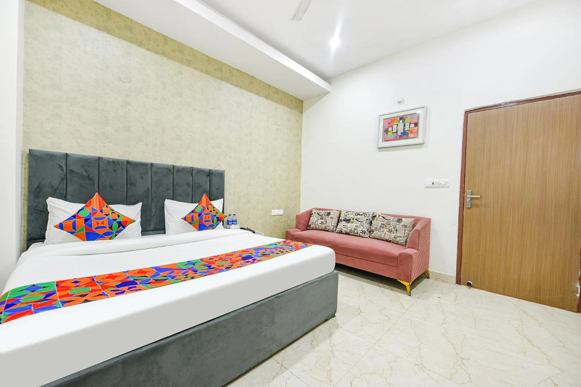 Bed in FabHotel Kavya Inn - Nr The Mall of Faridabad