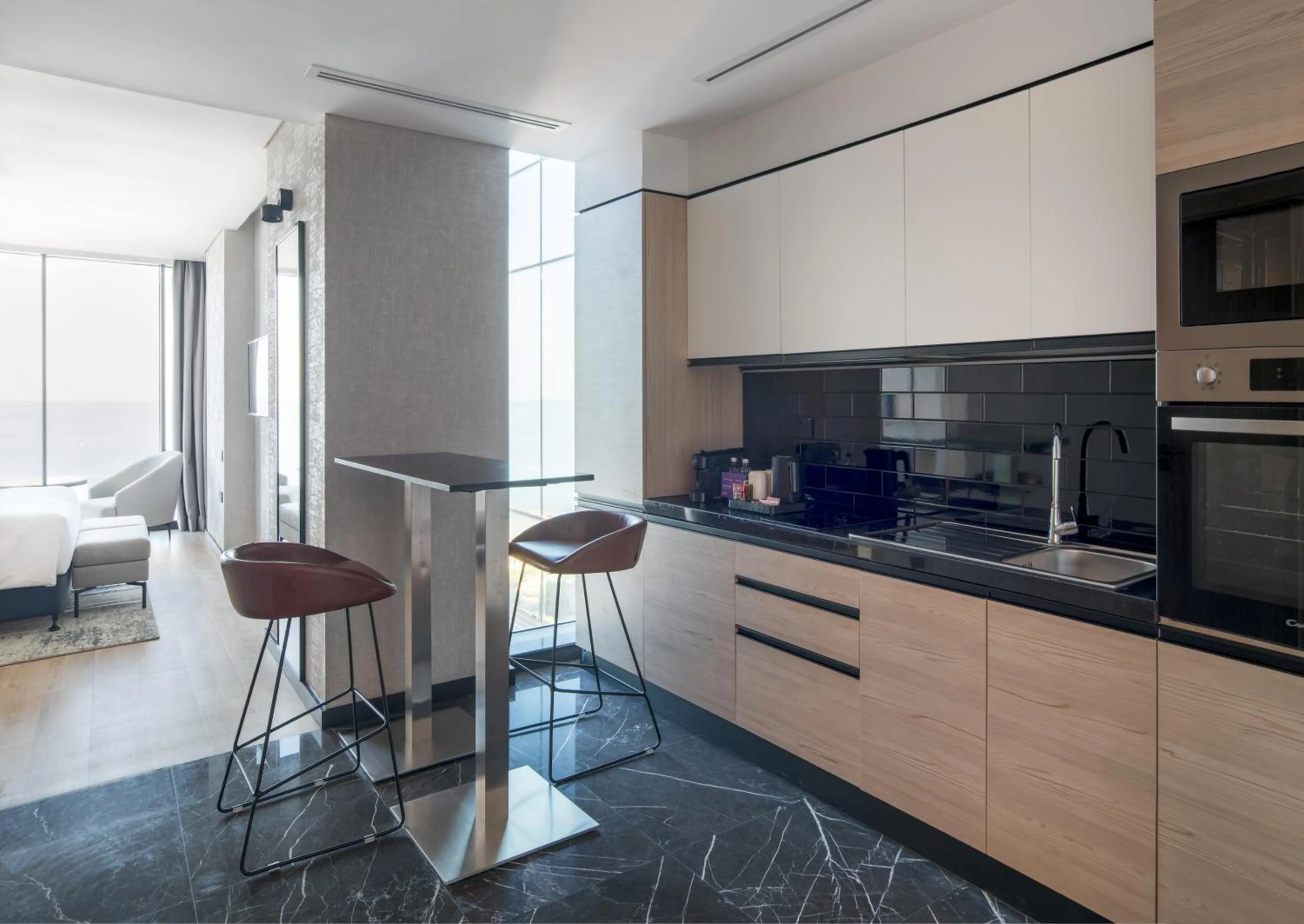 Kitchen or kitchenette in Park Inn by Radisson Hotel & Apartments Kuwait