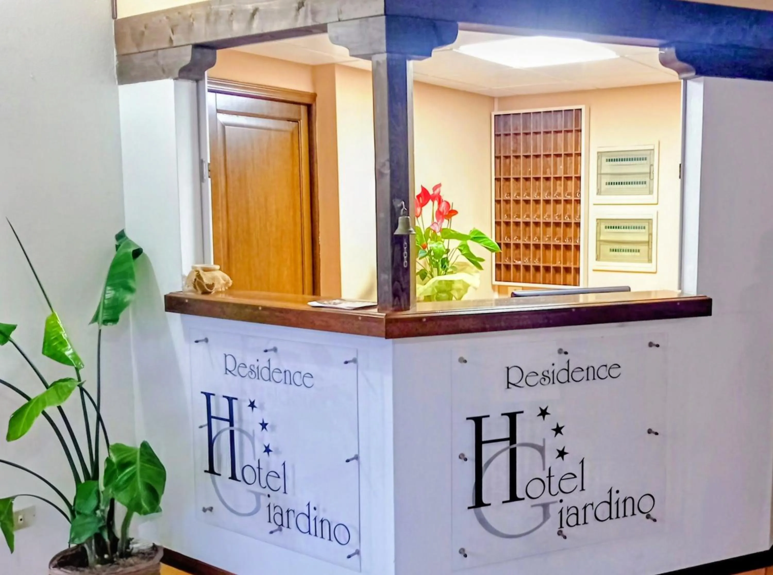 Property logo or sign in Residence Giardino