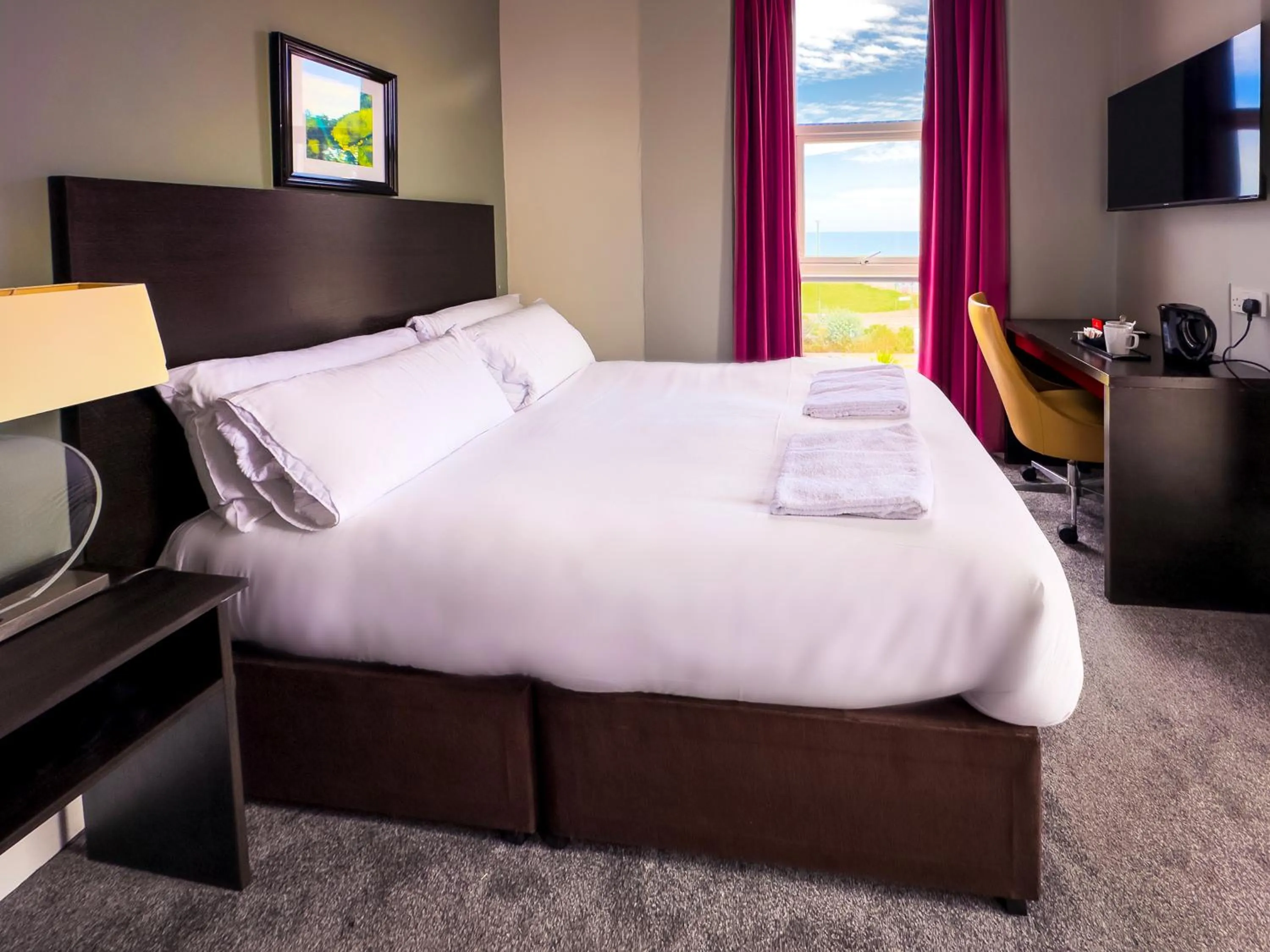 Bed in The Esplanade Hotel by Compass Hospitality