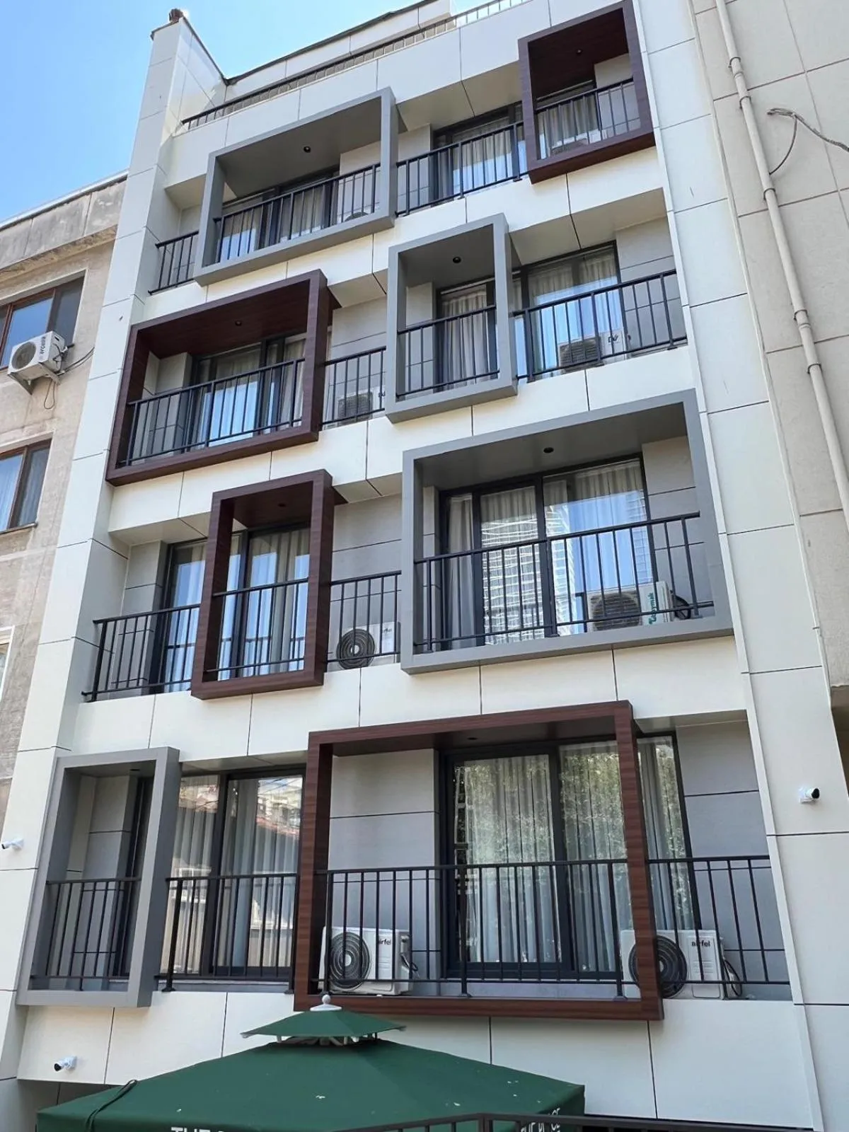 Property building in The Place Suit & Apartments