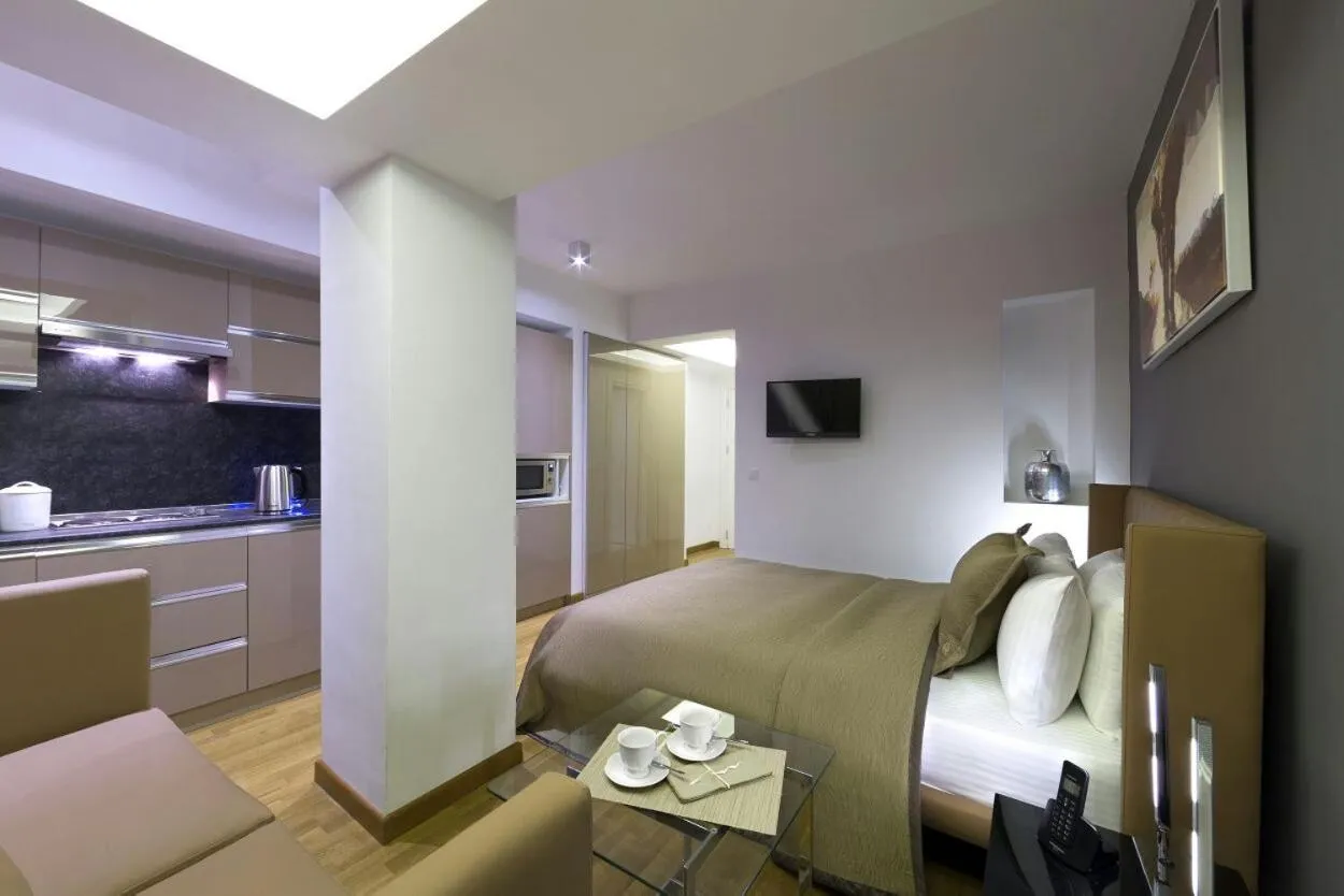 Bedroom in The Place Suit & Apartments