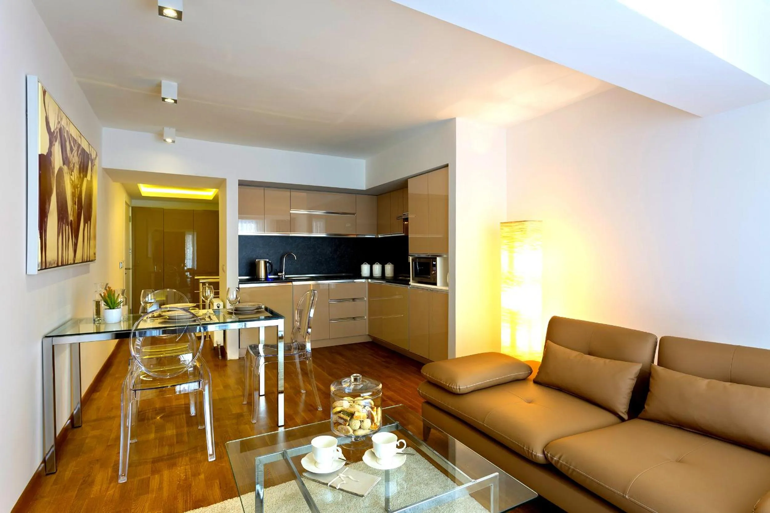 TV and multimedia in The Place Suit & Apartments