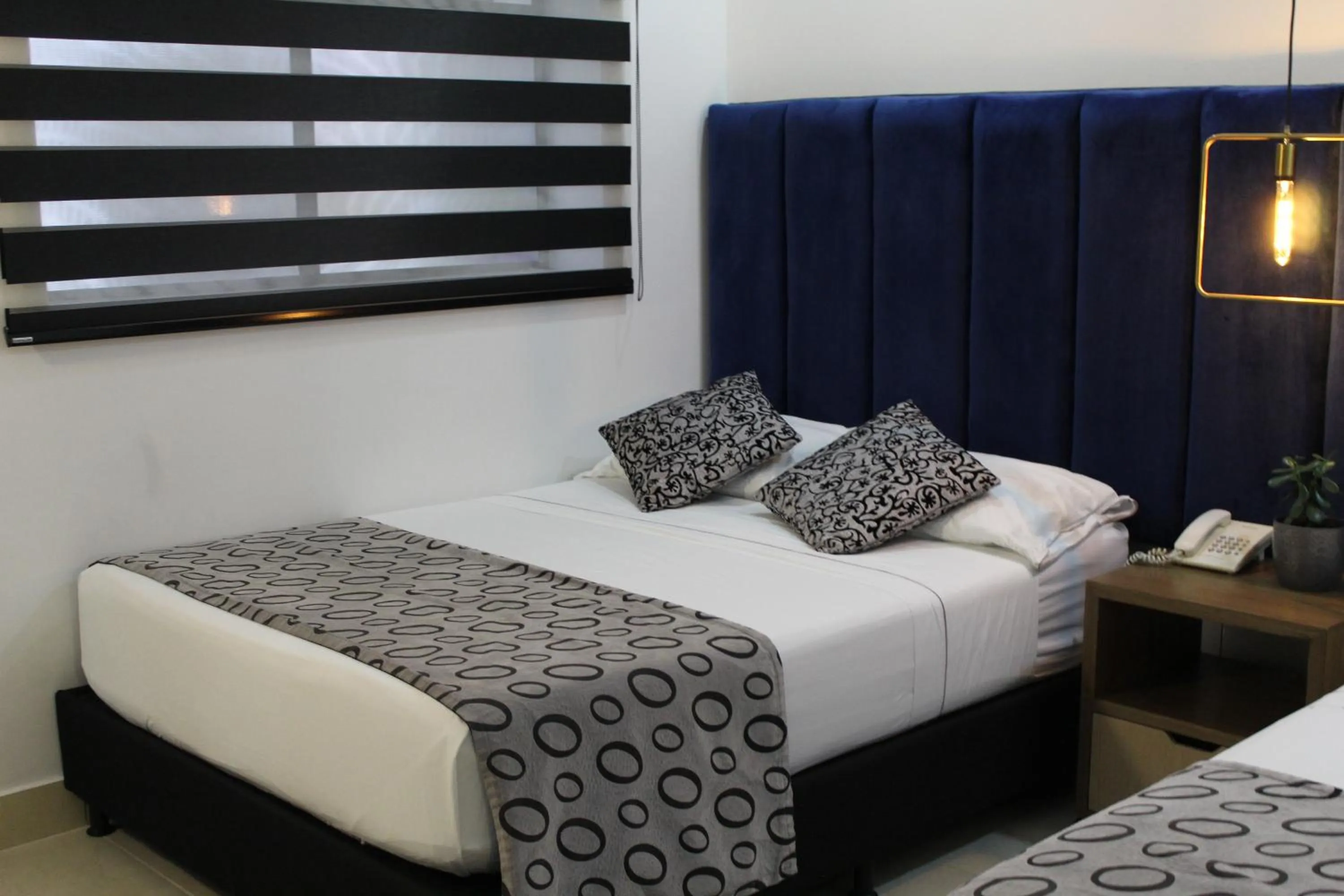 Bed in Hotel Merlott Lleras