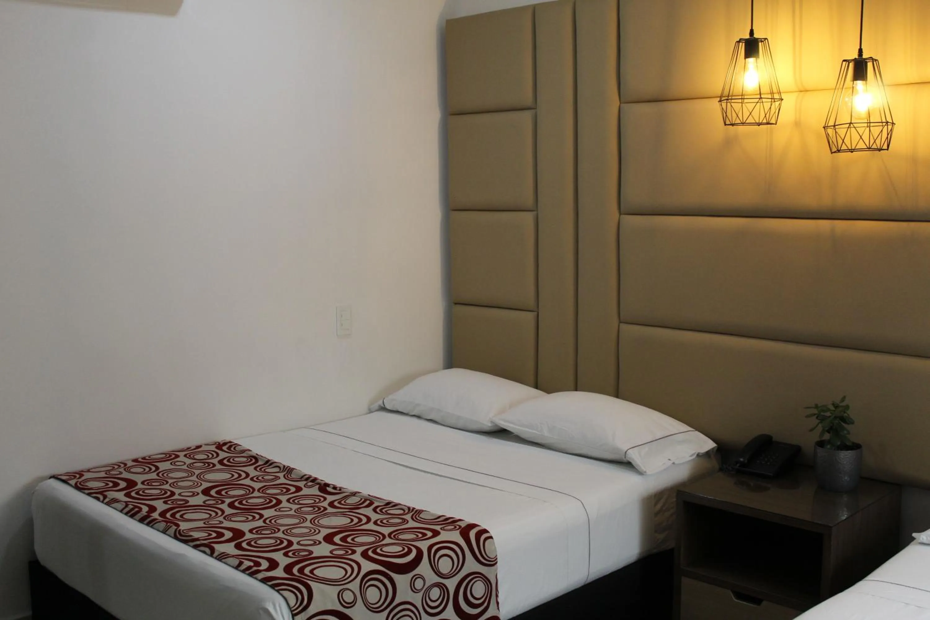 Bed in Hotel Merlott Lleras