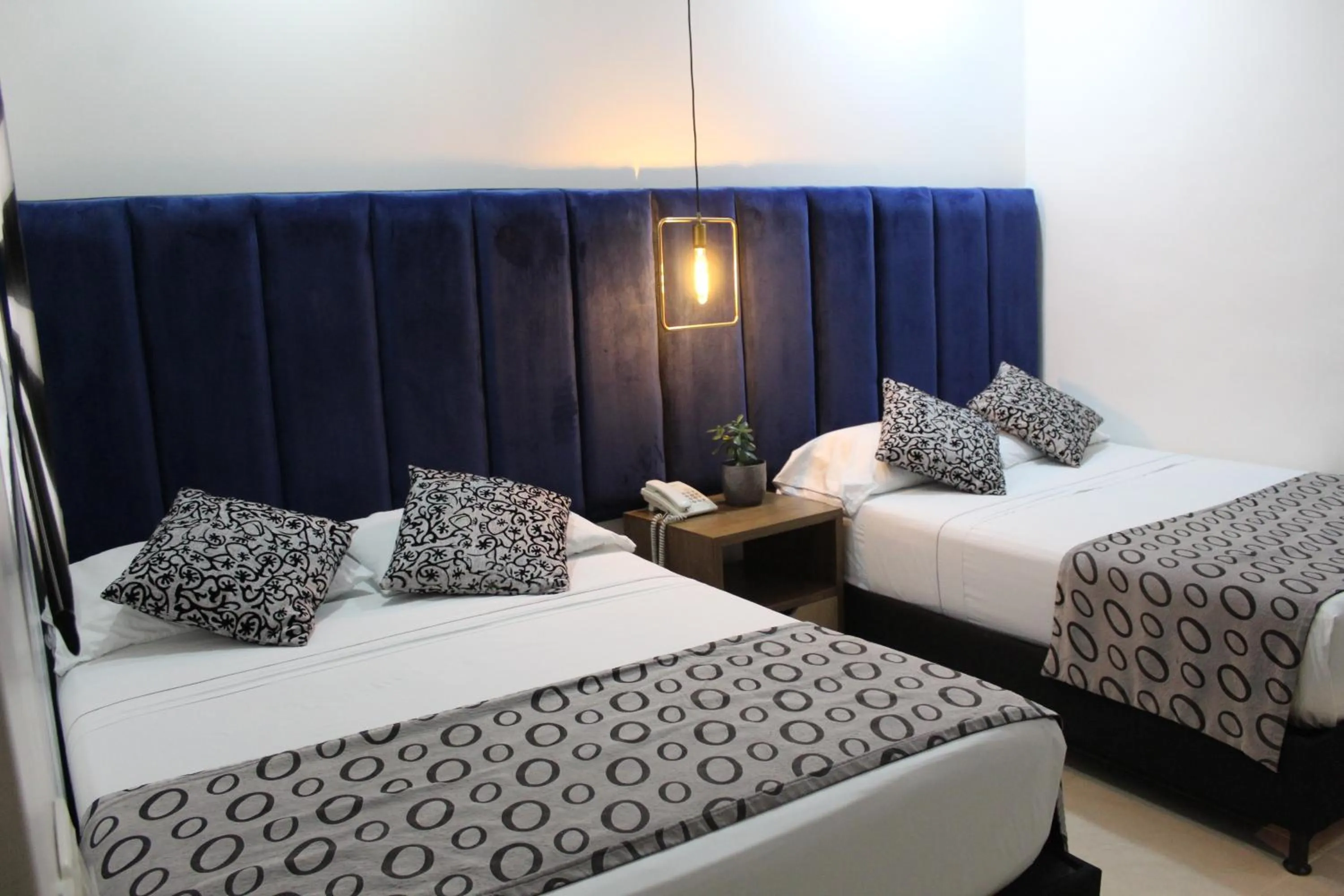 Bed in Hotel Merlott Lleras