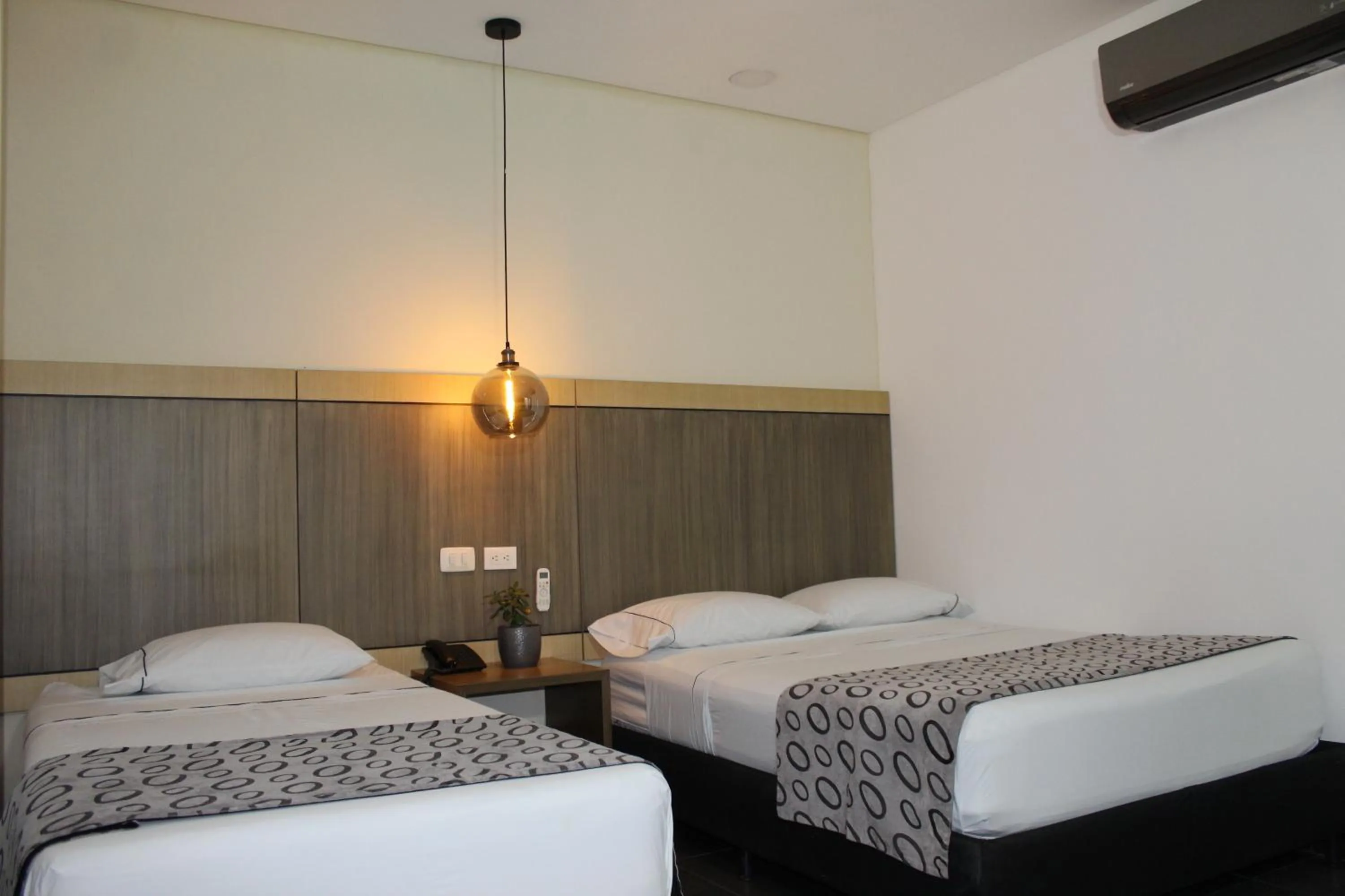 Bed in Hotel Merlott Lleras