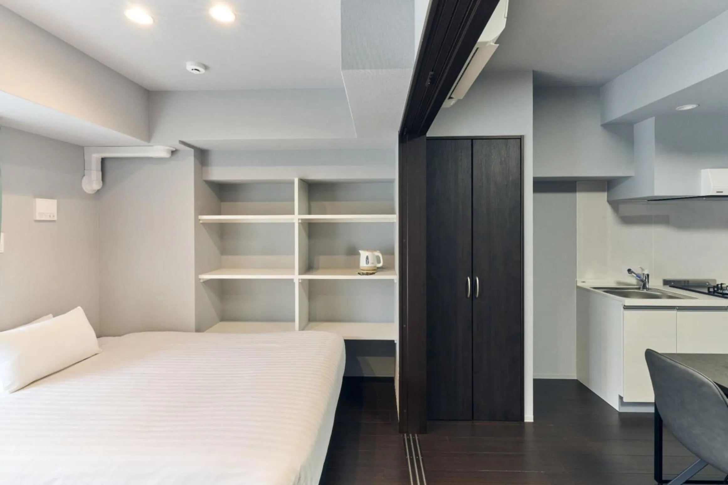 Bed in Vacation Rental Hotel TENMONKAN