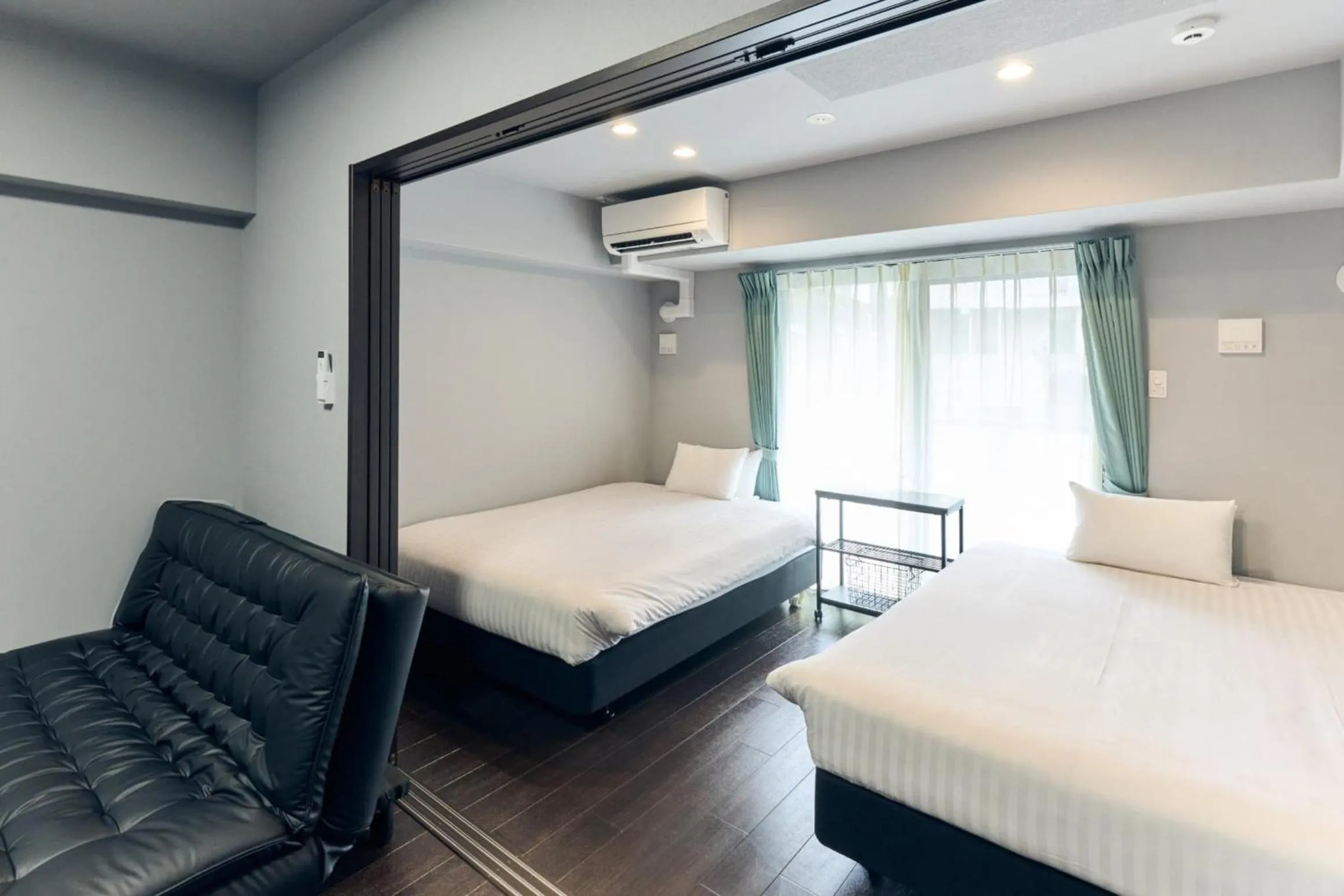 Bed in Vacation Rental Hotel TENMONKAN