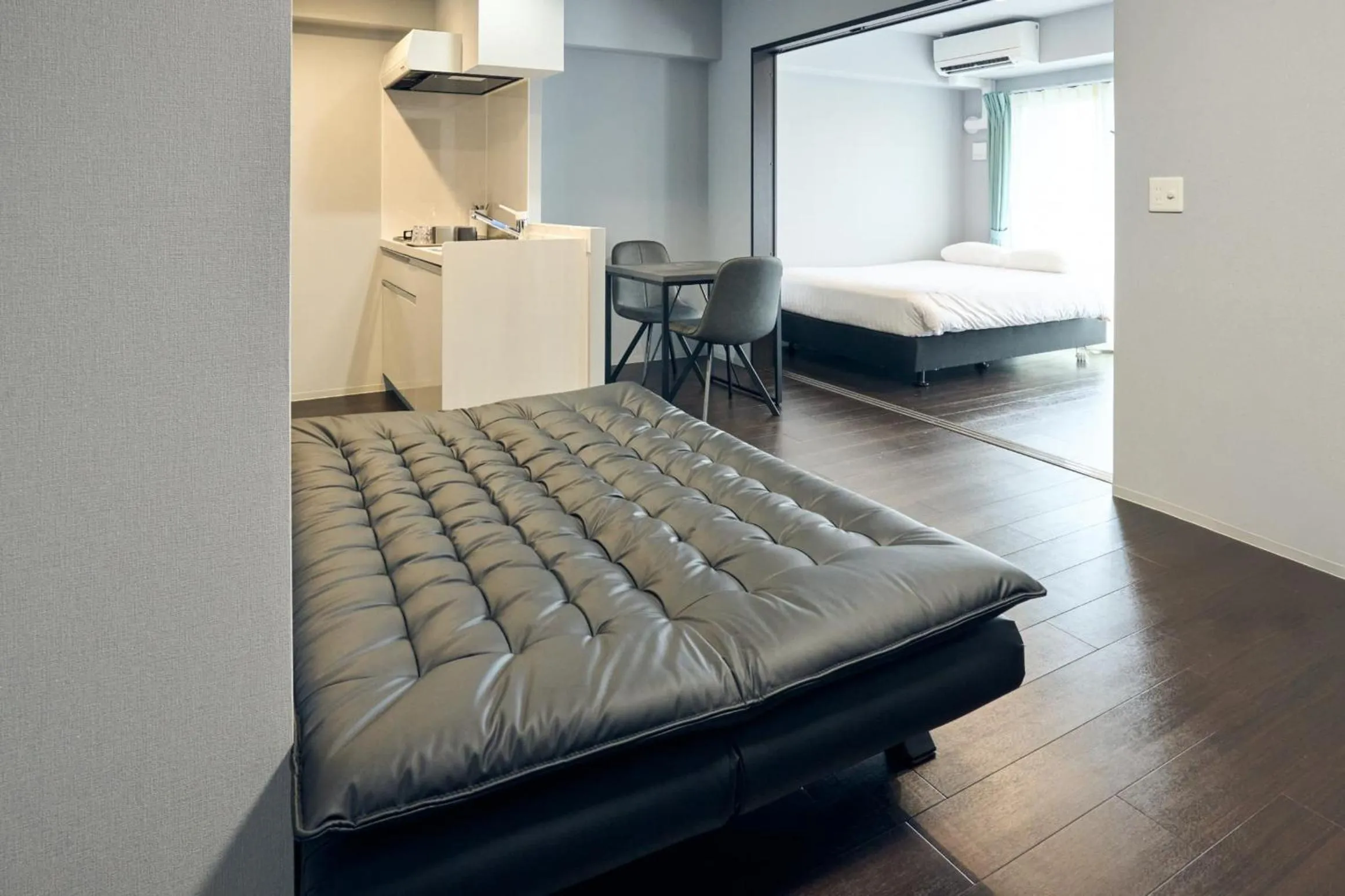 Bed in Vacation Rental Hotel TENMONKAN