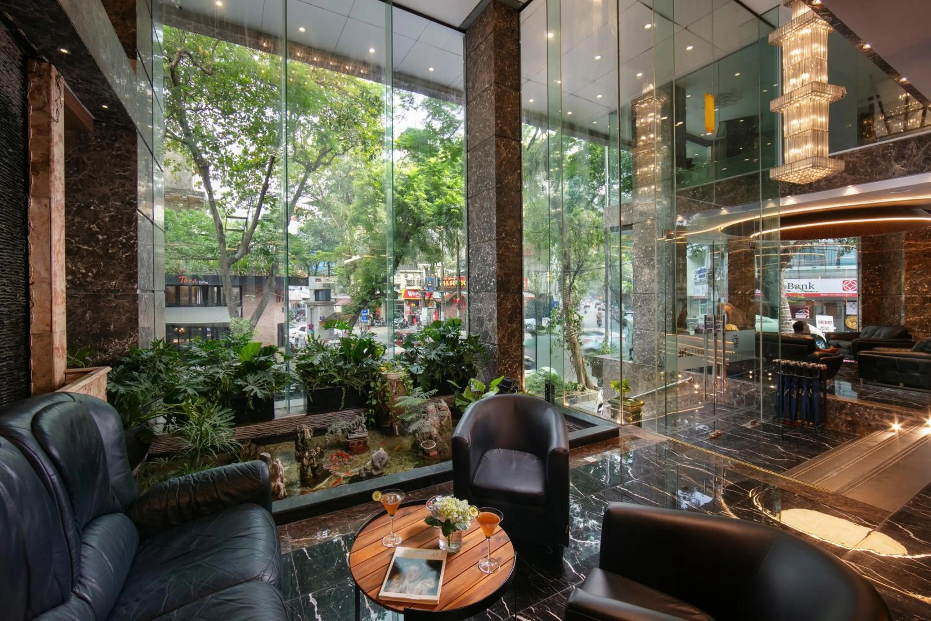 Lobby or reception in MAY DE VILLE Corner Hotel