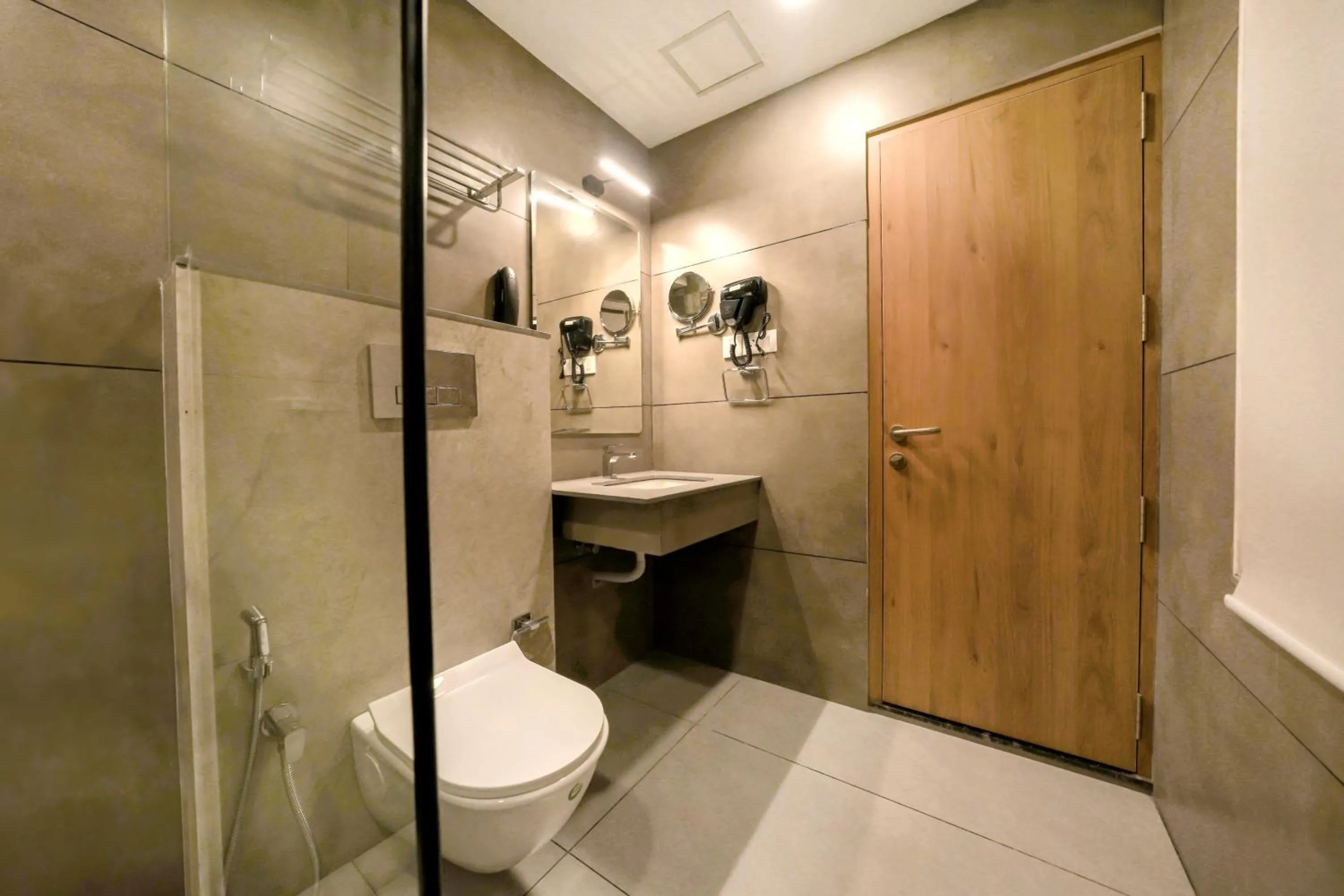 Toilet in Aurora Hotels and Resorts
