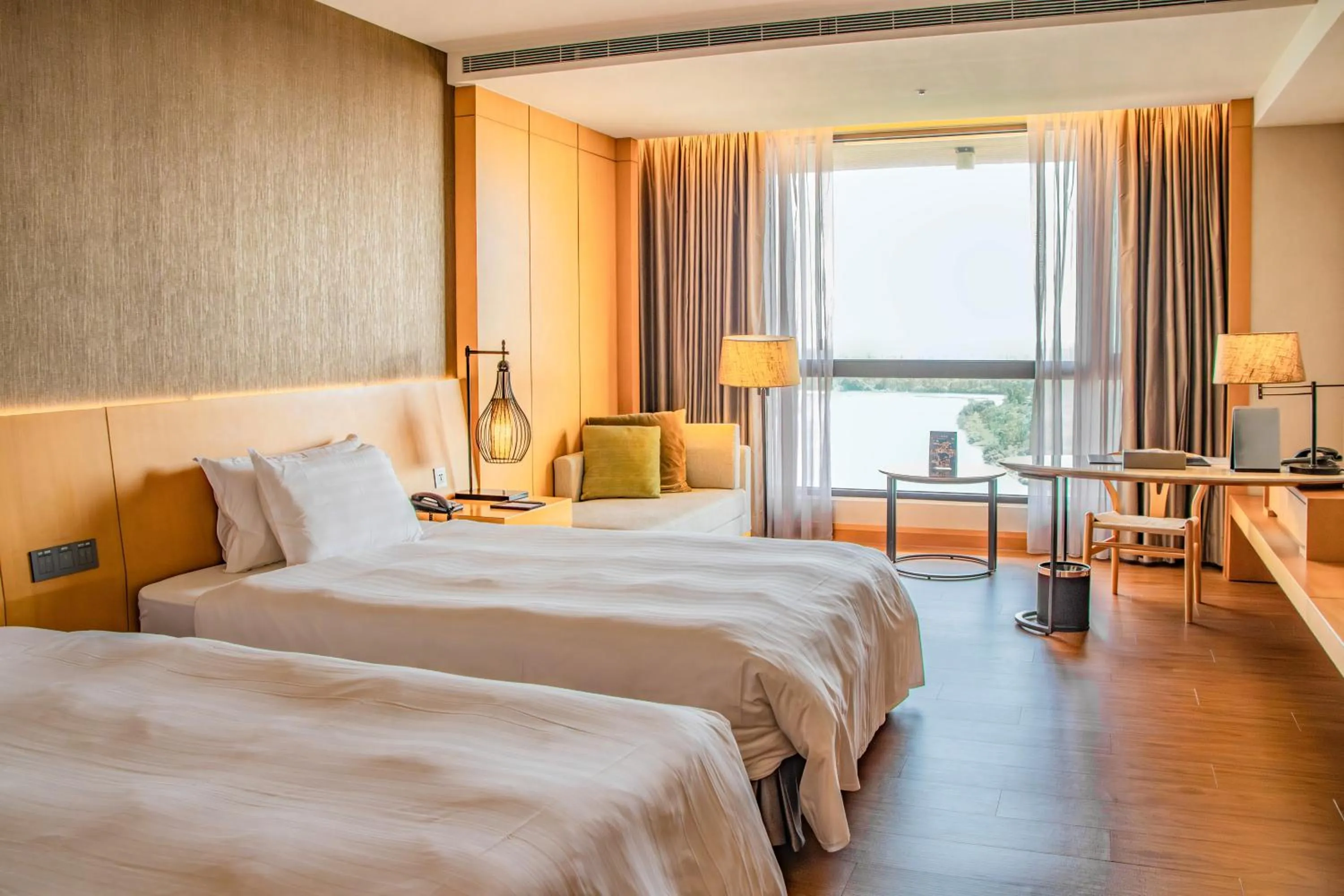 Photo of the whole room, Bed in Golden Lake Hotel