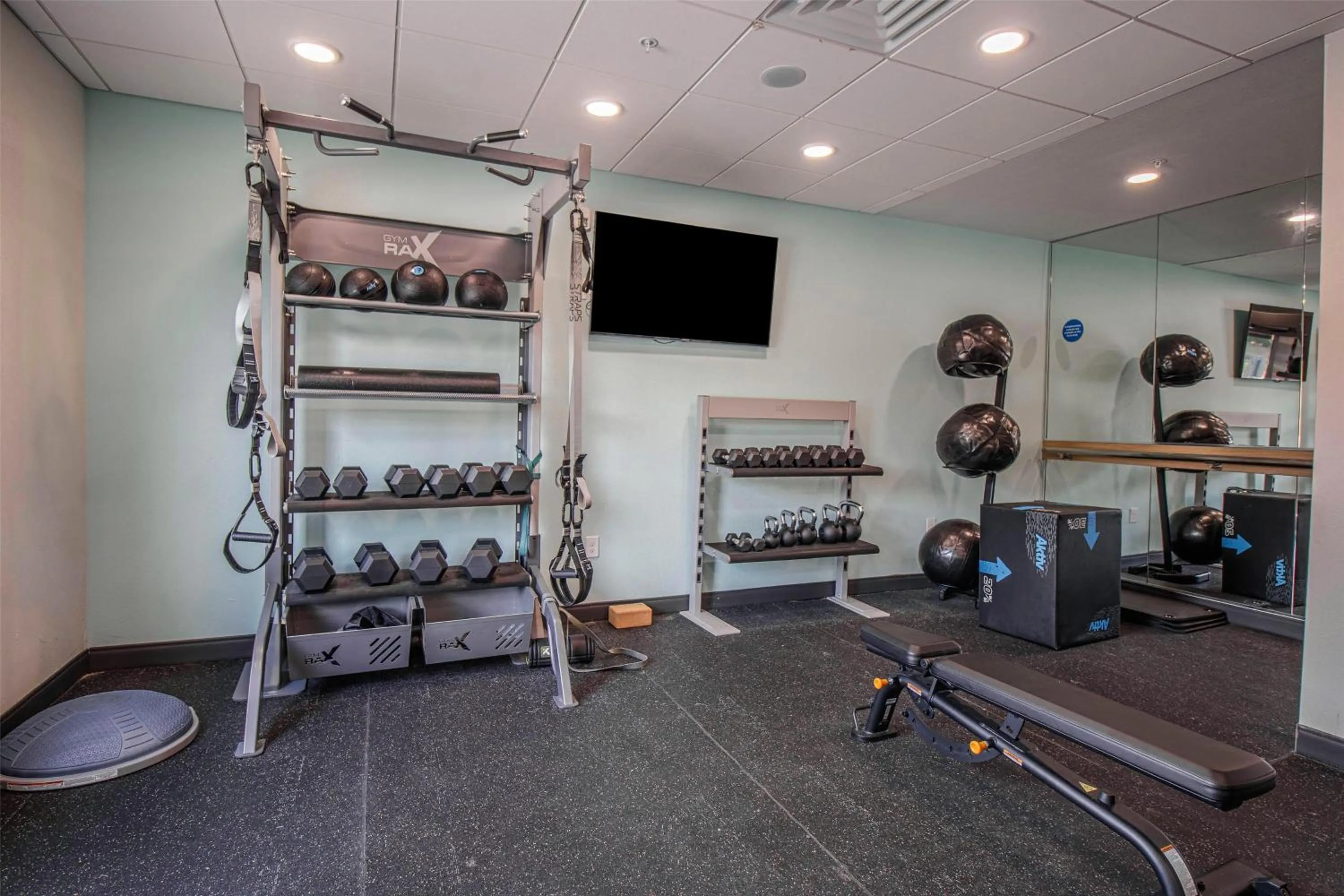 Fitness centre/facilities in Tru By Hilton Mckinney