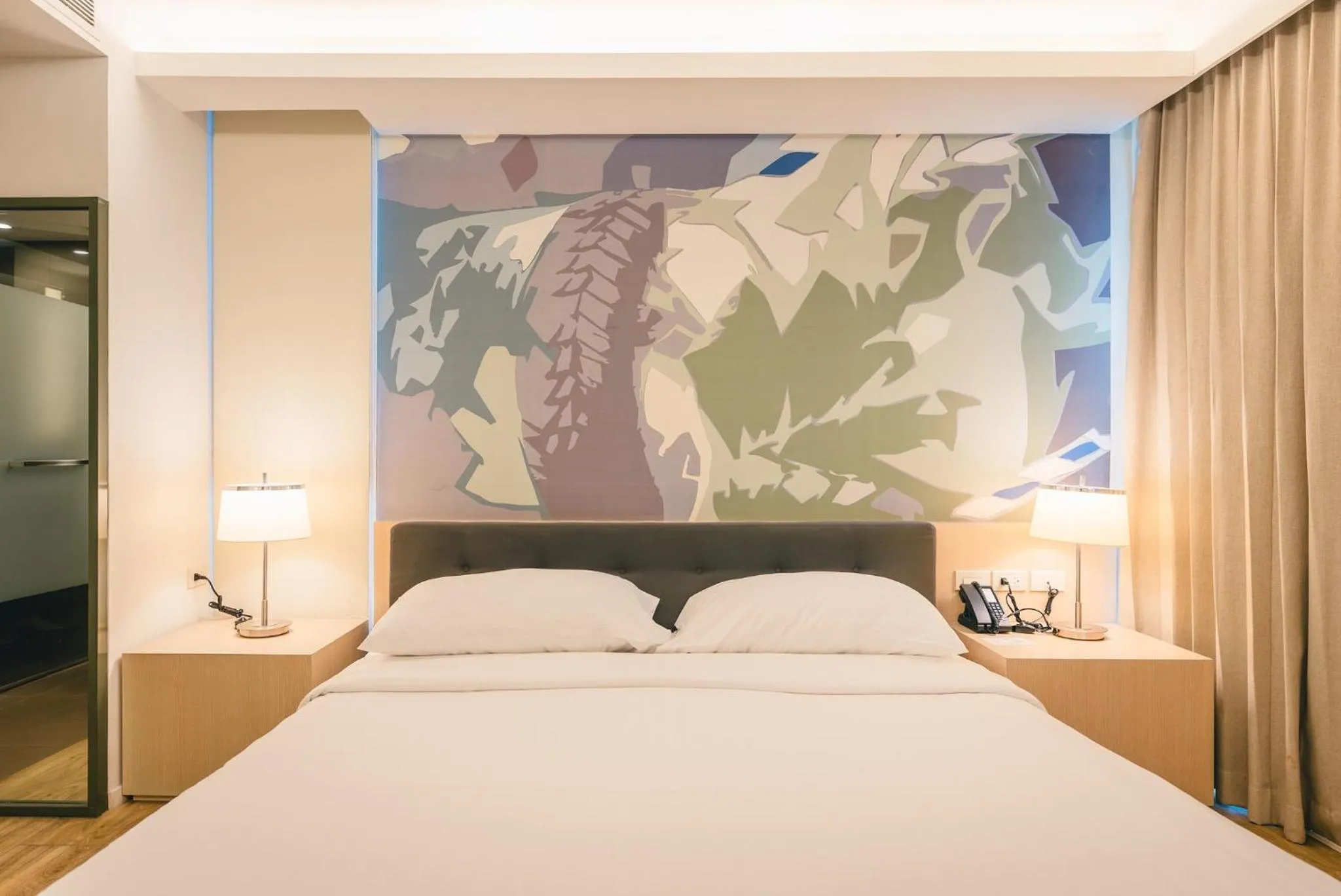 Bed in The Idle Hotel and Residence