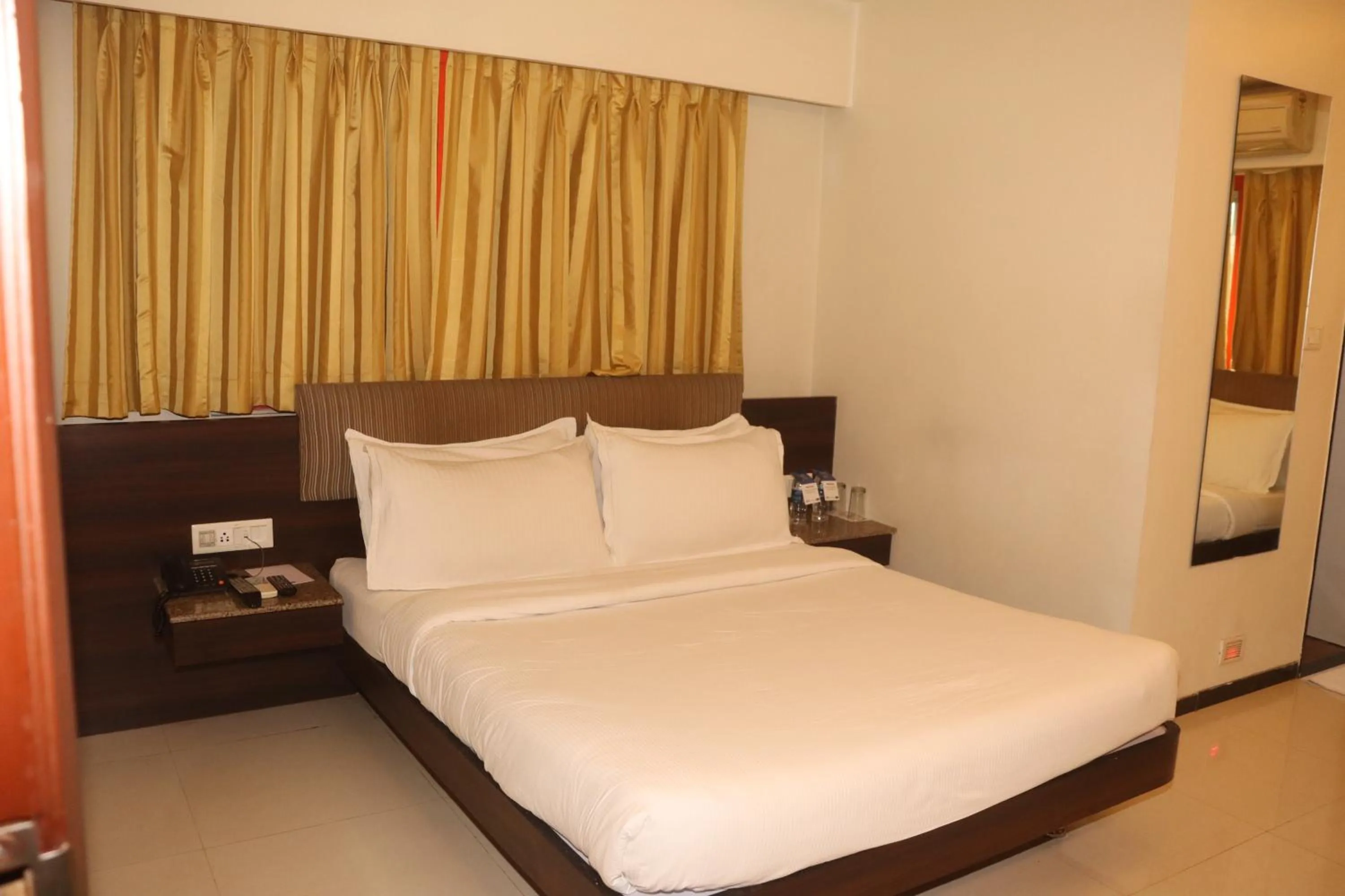 Bed in Kyriad Hotel Indore by OTHPL