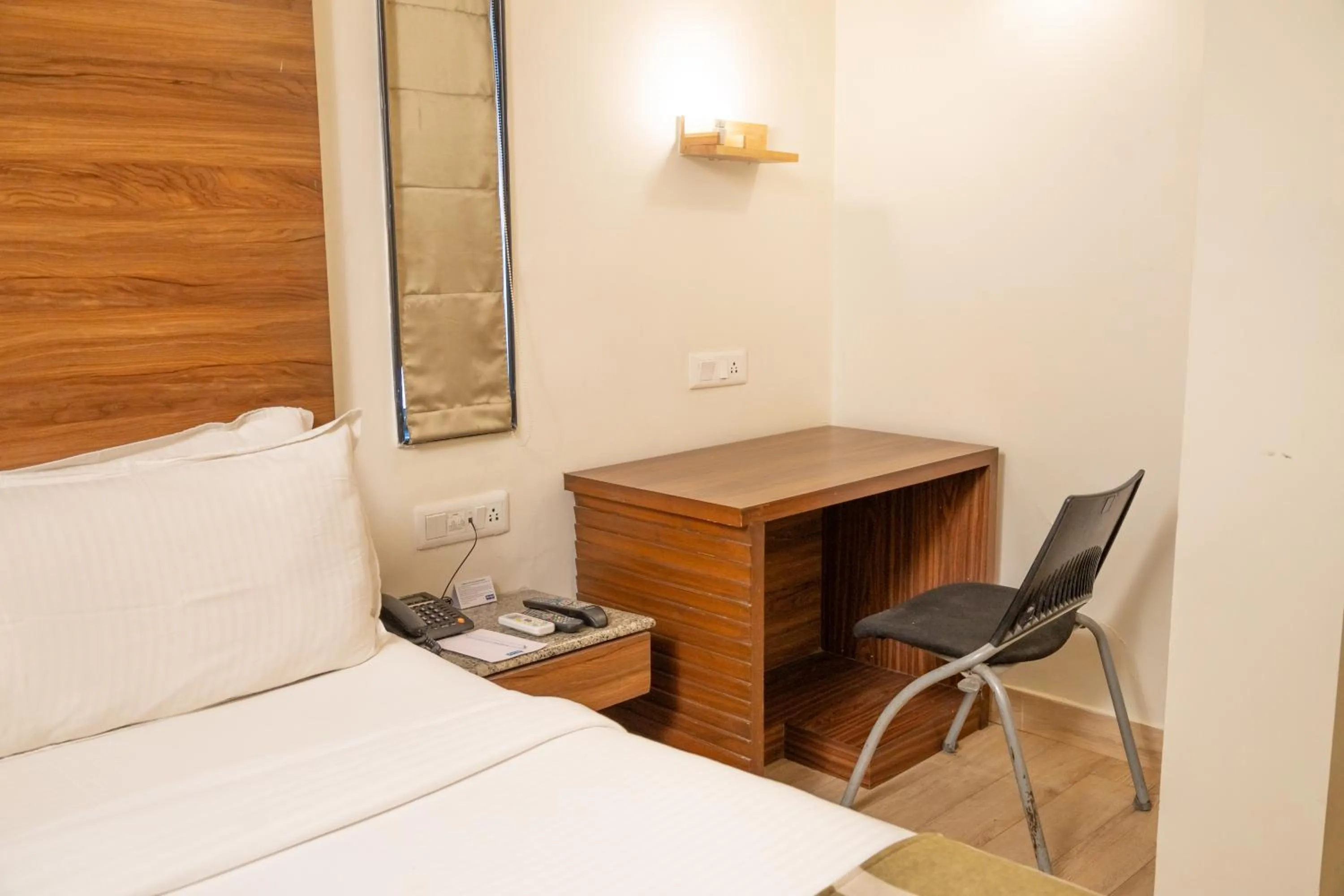 Bed in Kyriad Hotel Indore by OTHPL