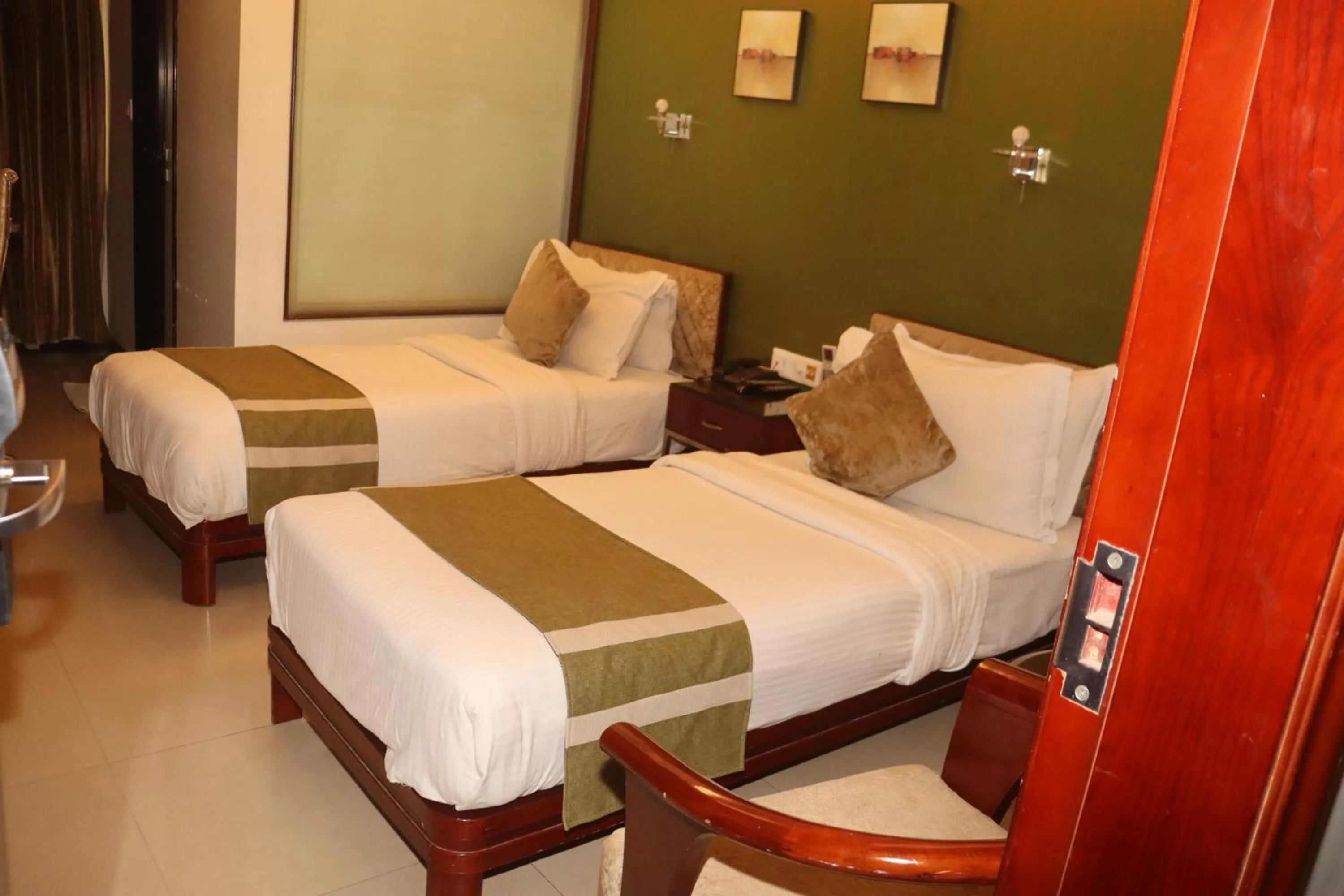 Bed in Kyriad Hotel Indore by OTHPL