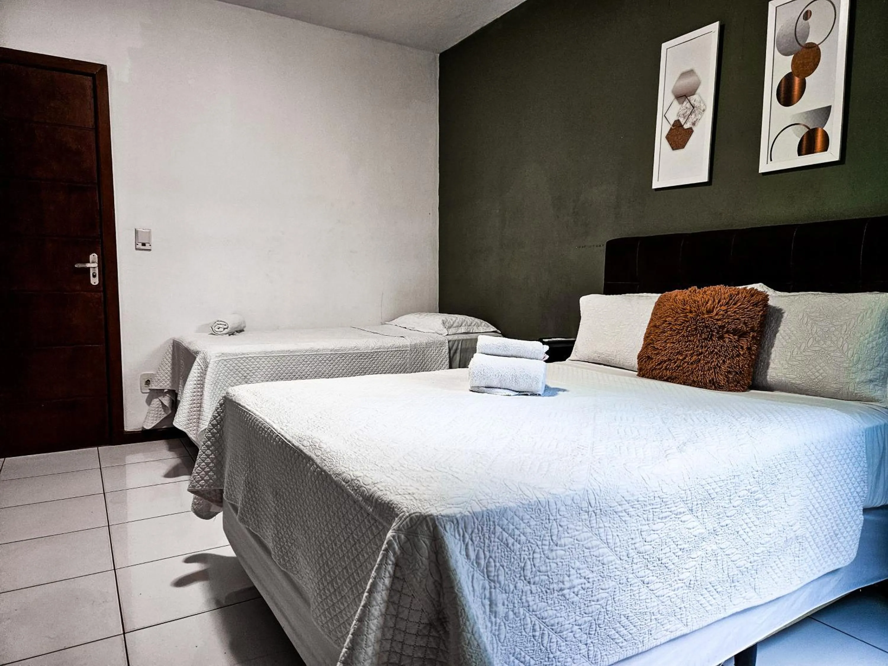 Bed in Pousada Abacateiro