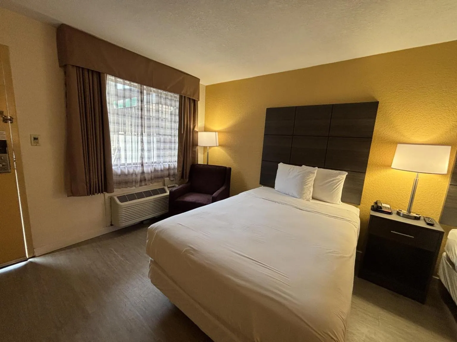 Photo of the whole room, Bed in Studio 6 Suites Charlotte, NC Northlake