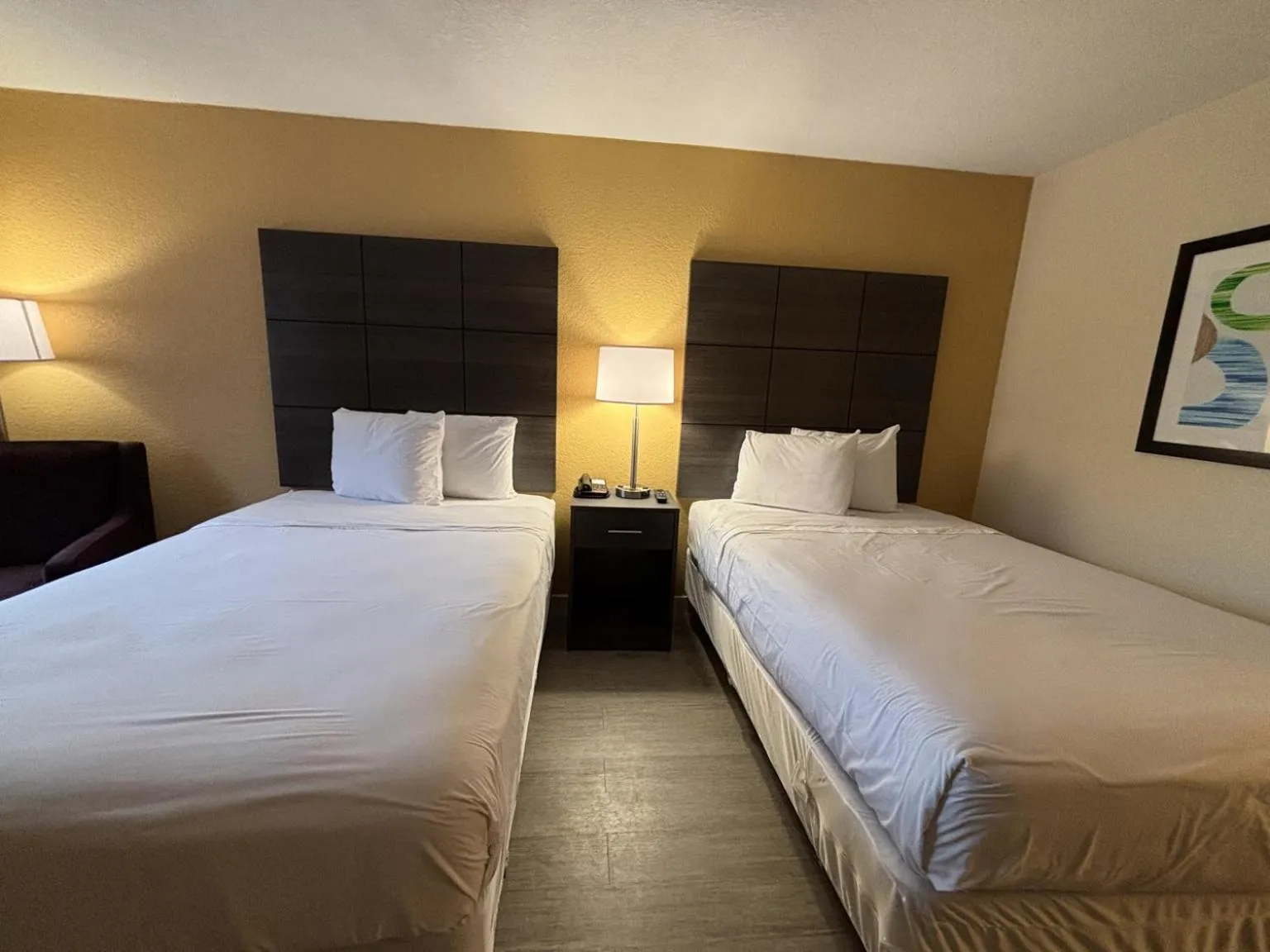 Photo of the whole room, Bed in Studio 6 Suites Charlotte, NC Northlake