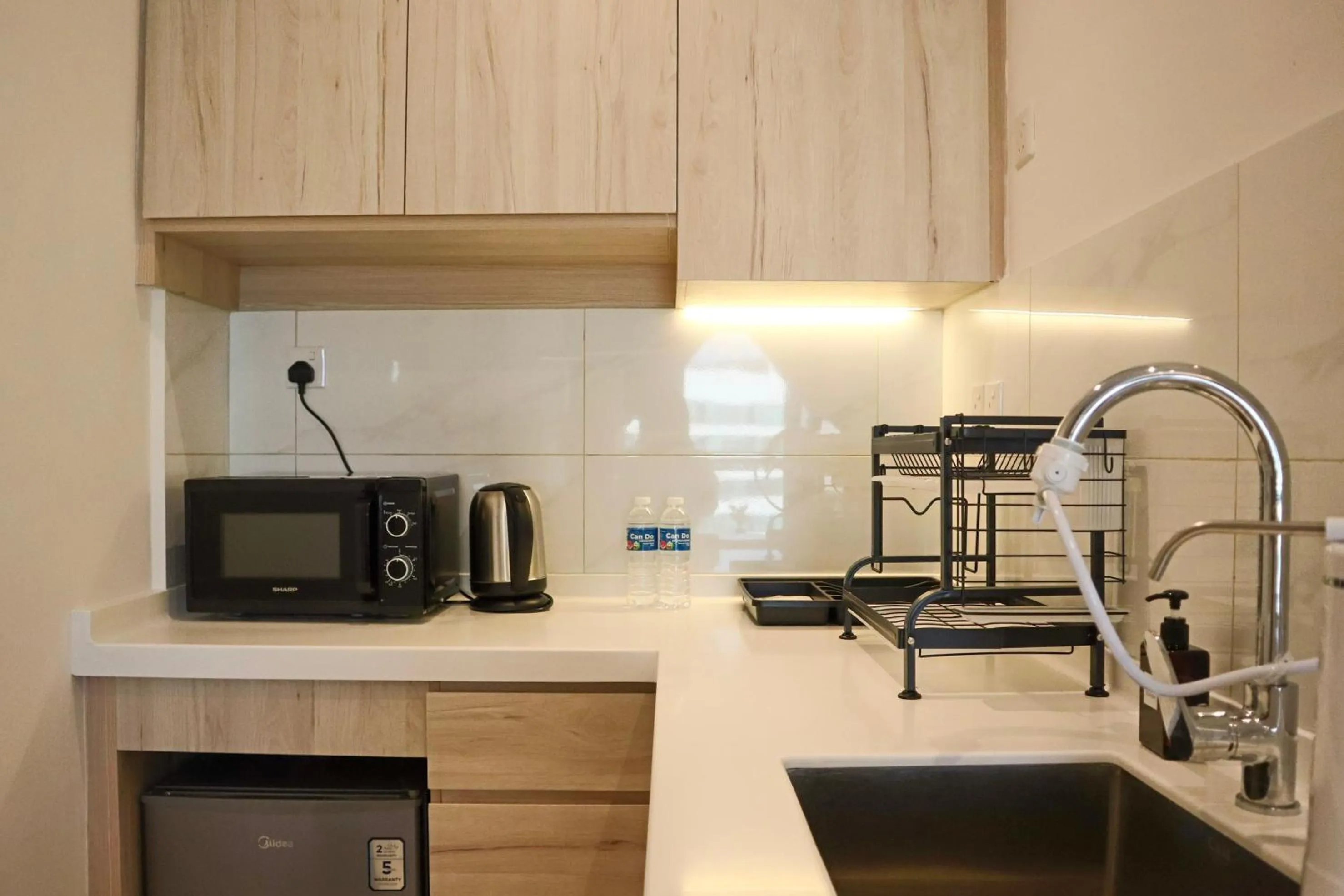 Kitchen or kitchenette in The SIGAR Hotel at Sutera Bay