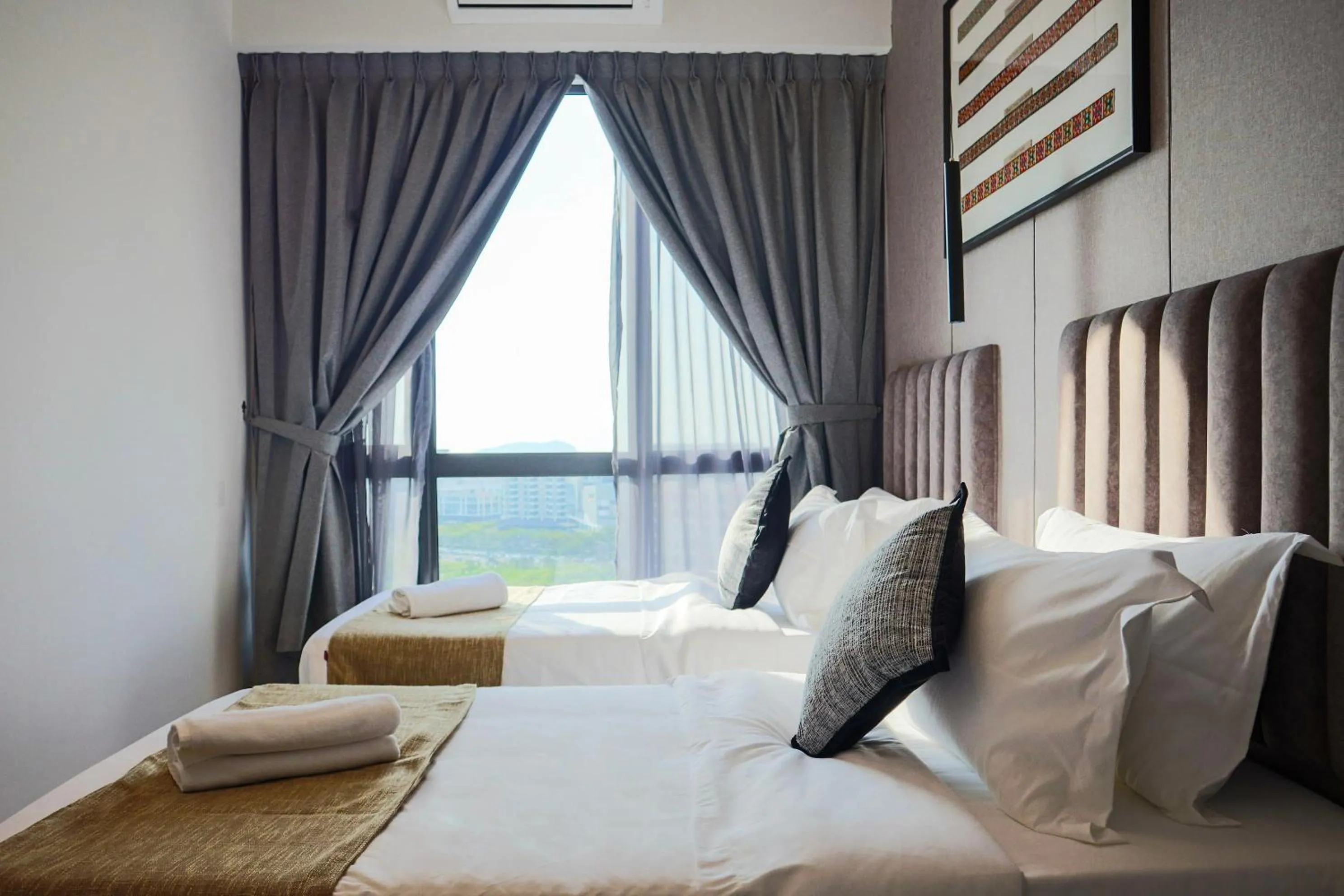 Bed in The SIGAR Hotel at Sutera Bay