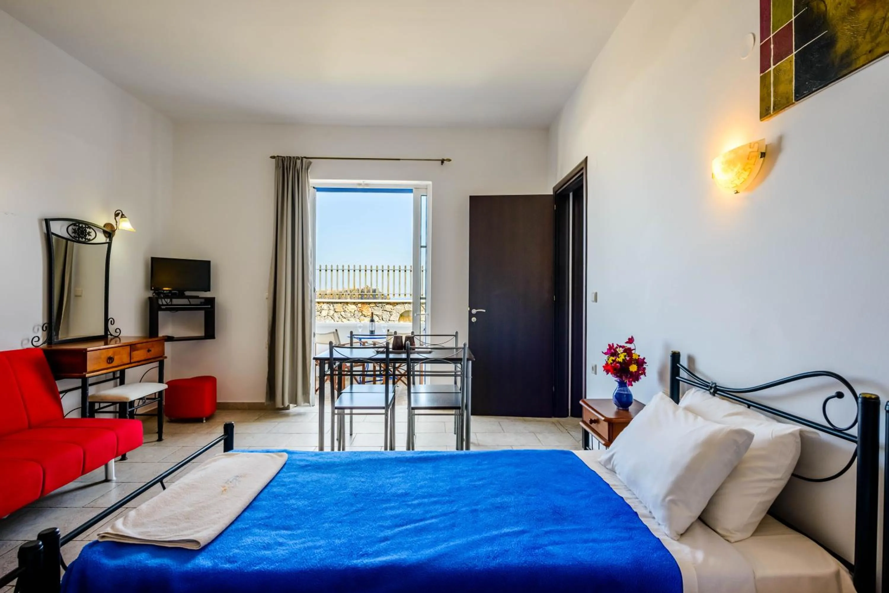 Bed in 'Lindian Myth' Sea View Studios