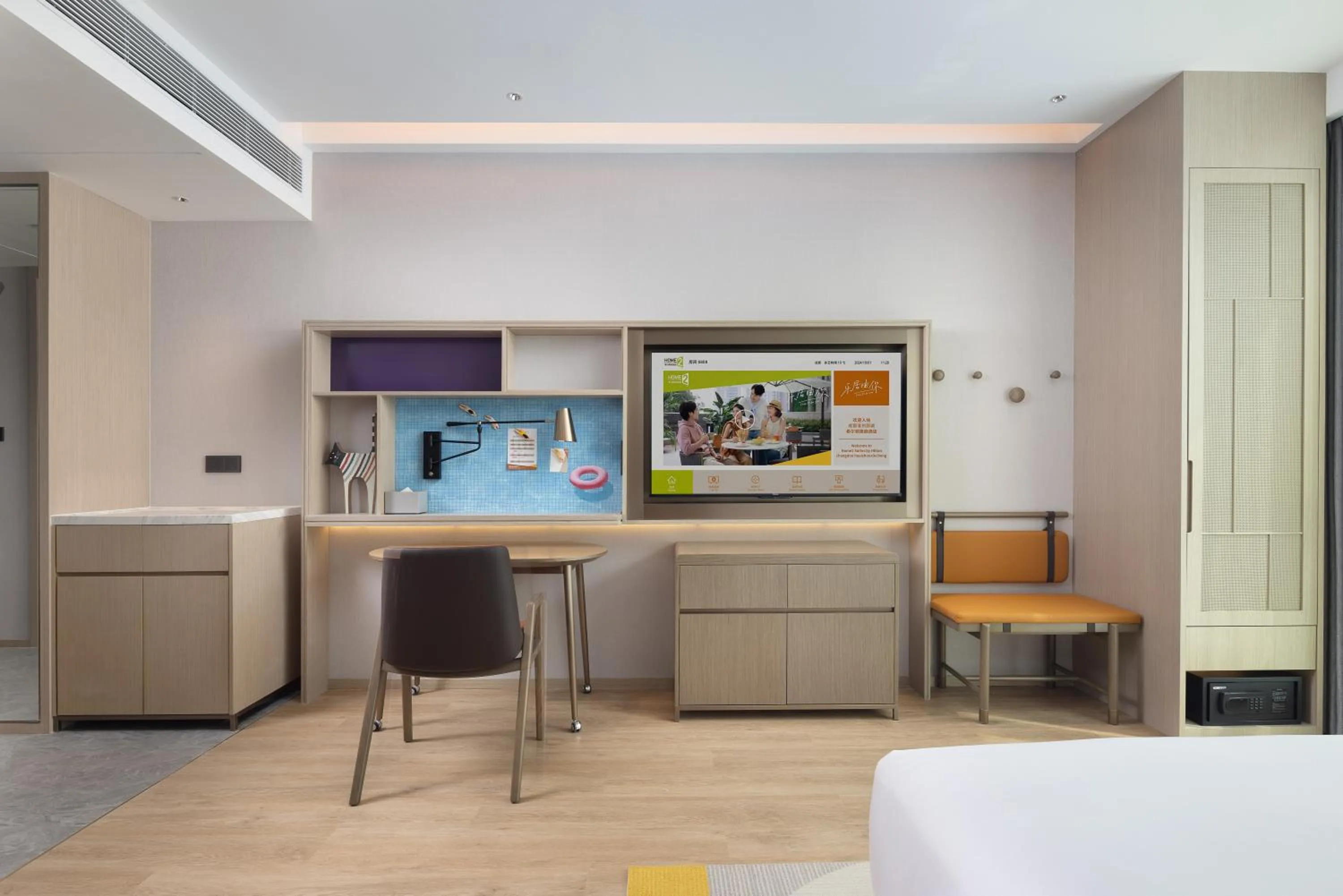 TV and multimedia in Home2 Suite by Hilton Chengdu Huaizhou New Town