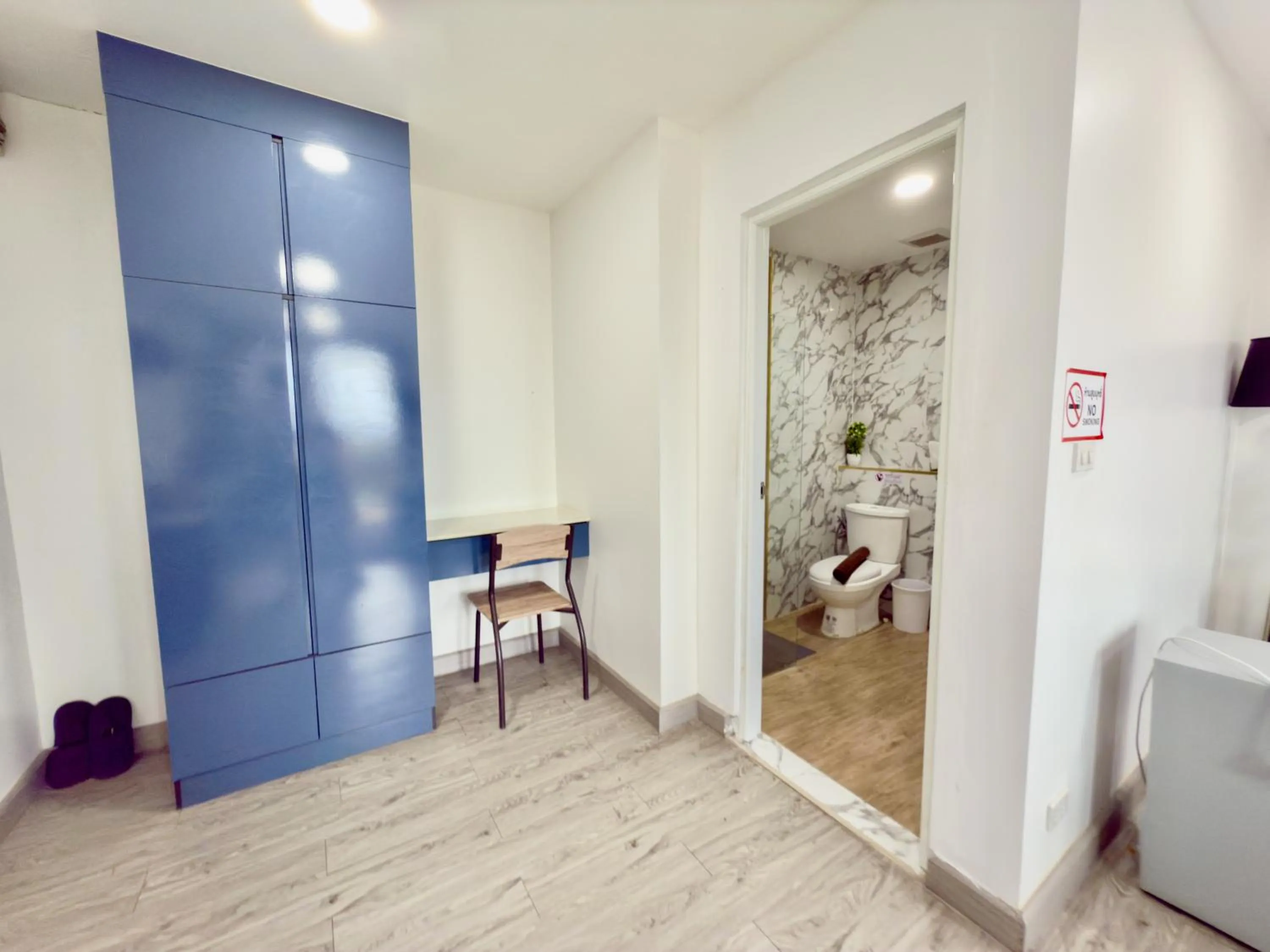 Bedroom in Breezewood Bangkok Hotel