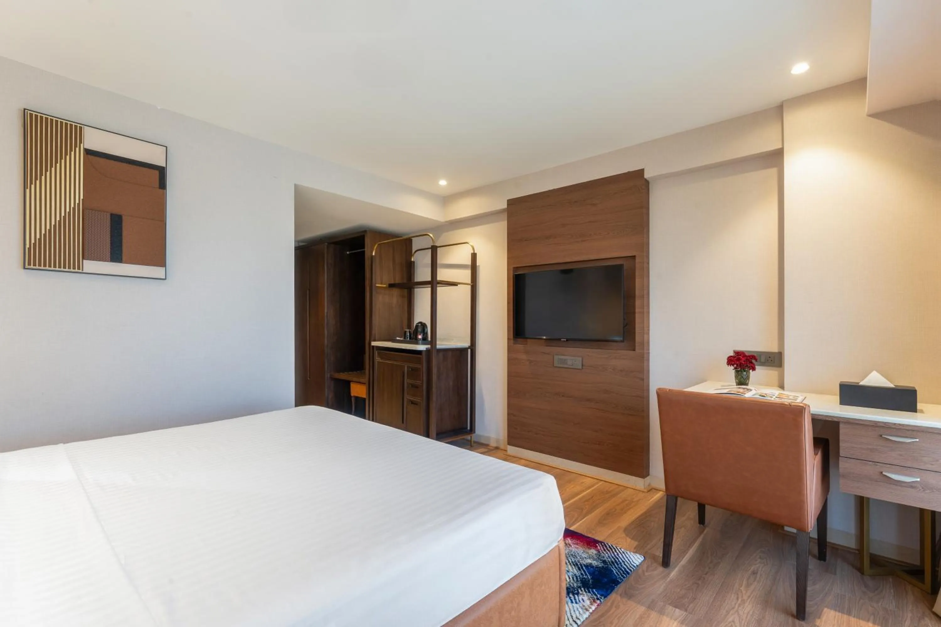 Bedroom, Bed in Clarks Inn Suites Hyderabad Airport