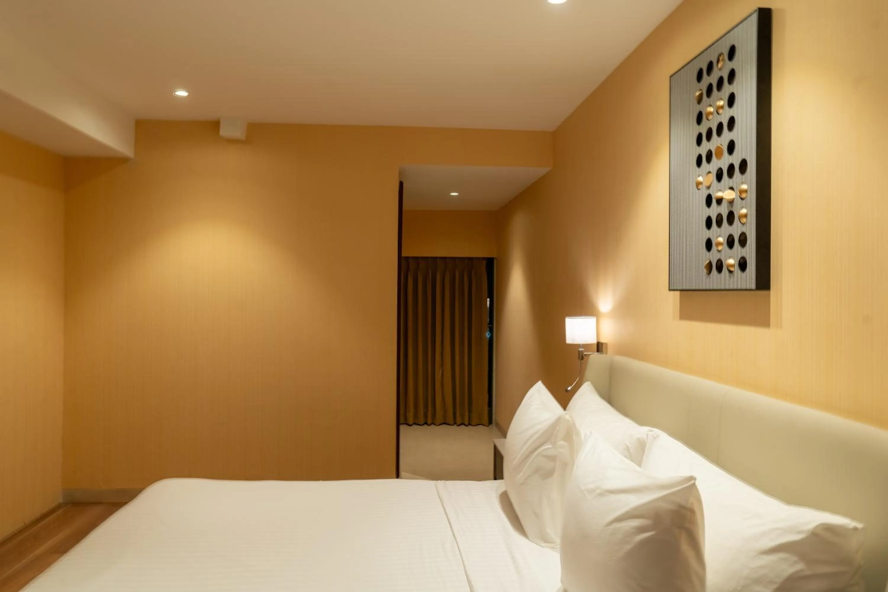 Bed in Clarks Inn Suites Hyderabad Airport